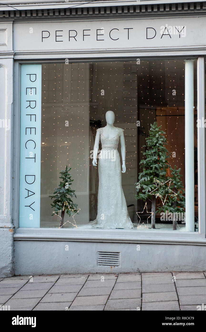 Perfect Day Bridal shop with Christmas window dressing, Silver Street, Bradford on Avon, Wiltshire, UK. Stock Photo