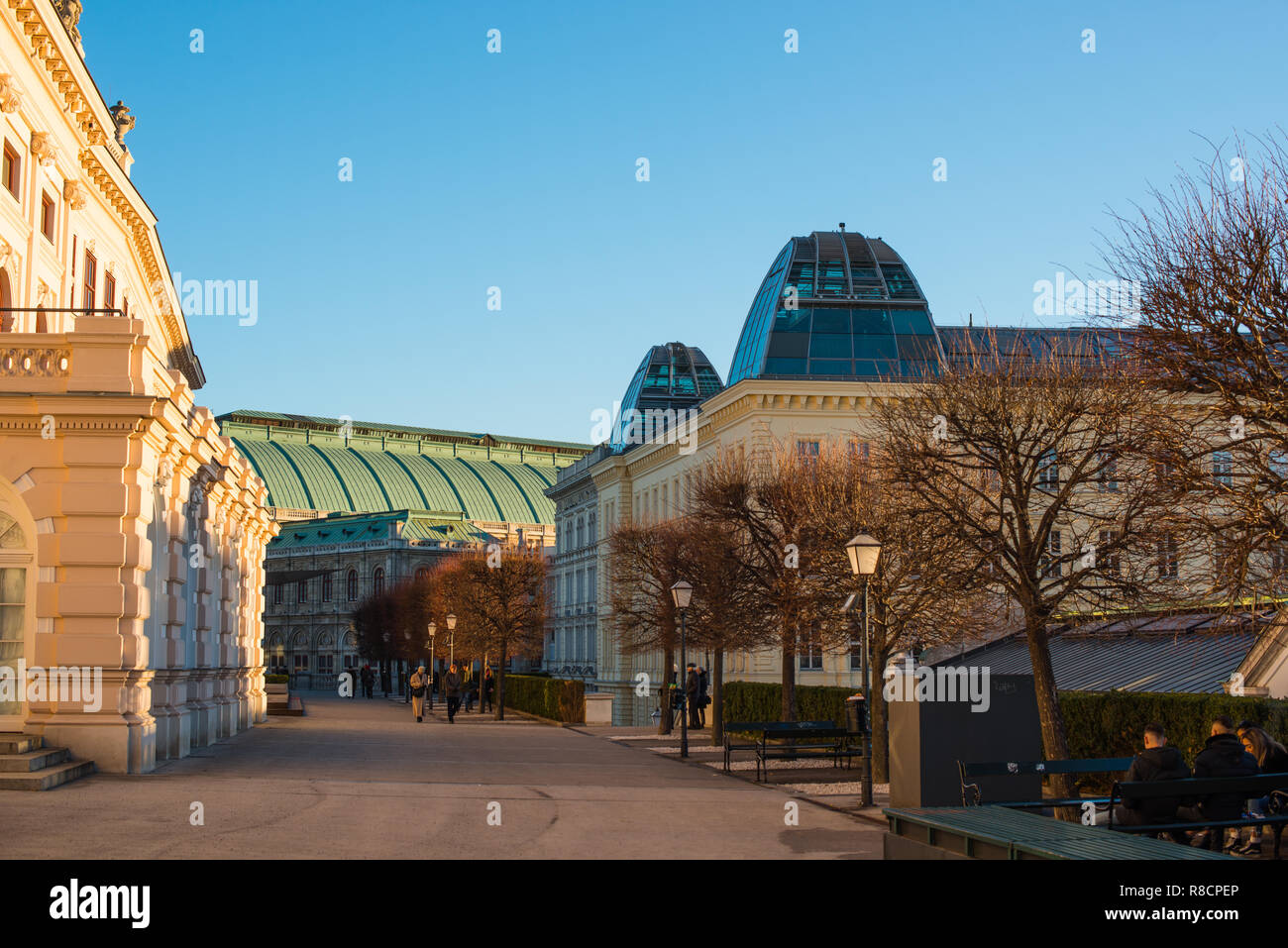 Street scene in the Innere Stadt (First District) of Vienna with the Alberina museum to the left and Opera house to the rear, Austria. Stock Photo