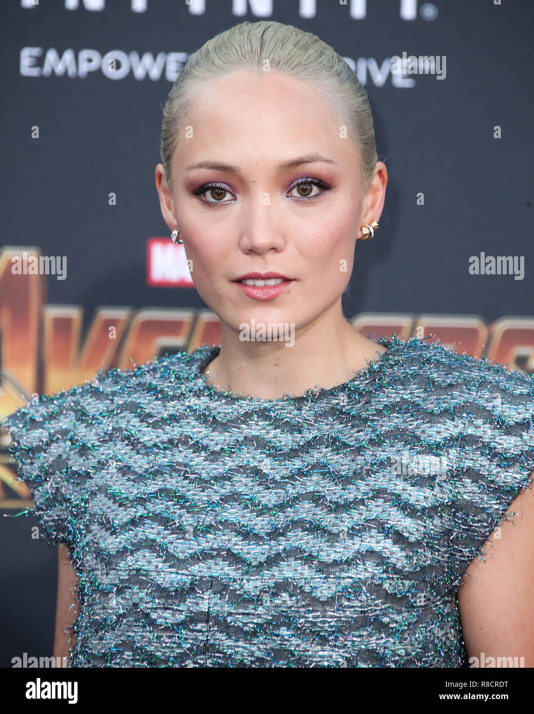 HOLLYWOOD, LOS ANGELES, CA, USA - APRIL 23: Pom Klementieff at the World Premiere Of Disney And Marvel's 'Avengers: Infinity War' held at the El Capitan Theatre, Dolby Theatre and TCL Chinese Theatre IMAX on April 23, 2018 in Hollywood, Los Angeles, California, United States. (Photo by Xavier Collin/Image Press Agency) Stock Photo