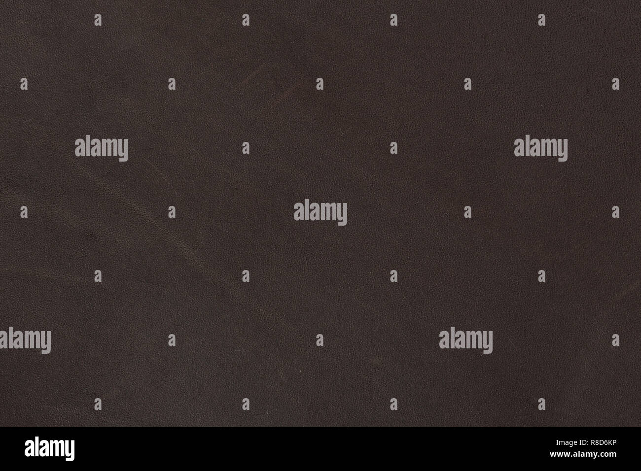 Vintage style texture from dark brown leather. Stock Photo