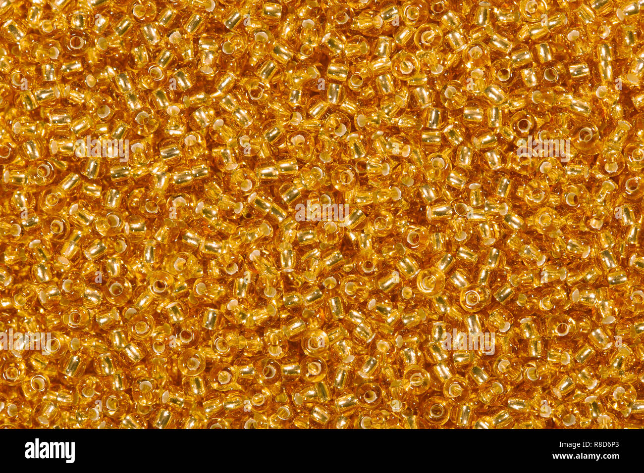 Many orange glass beads. High resolution photo of beads Stock Photo Alamy