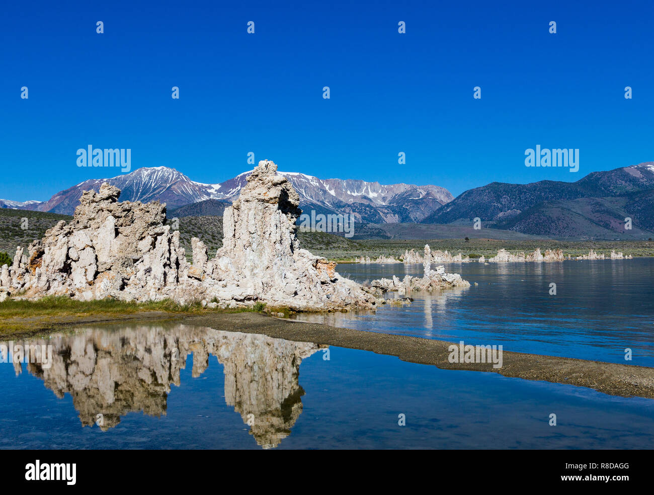 Subsurface waters enter the bottom of Mono Lake through small springs.  It took many decades to form the well-recognized tufa towers. When lake levels Stock Photo