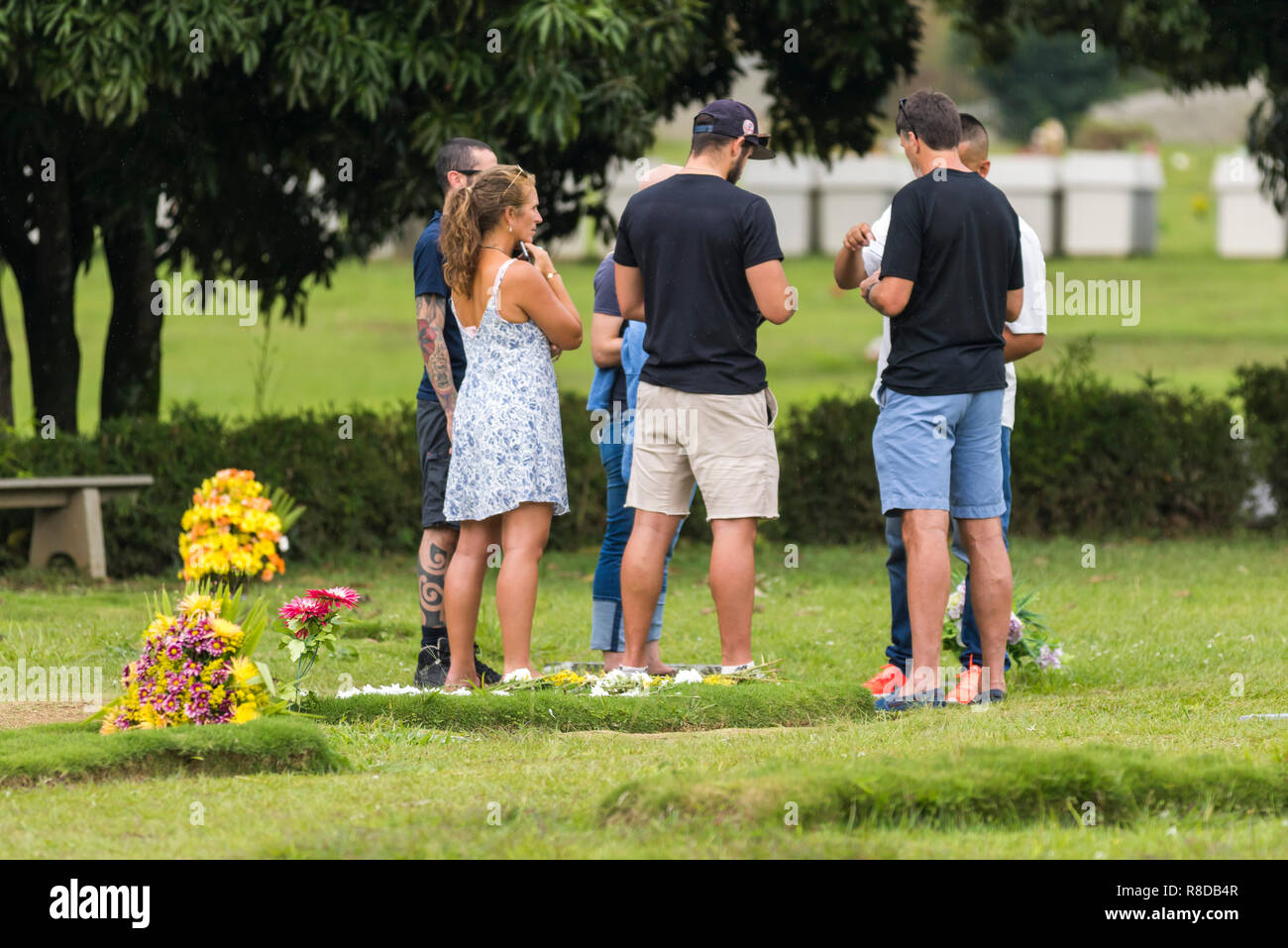 Tourists visiting the tomb of Griselda Blanco in the Jardines de Montesacro cemetery Stock Photo