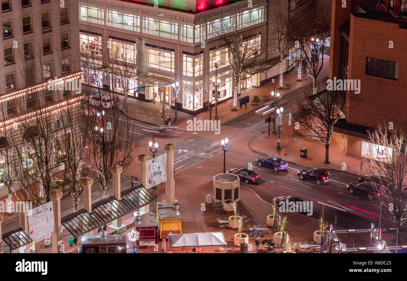 Busy intersection in city at night. Stock Photo