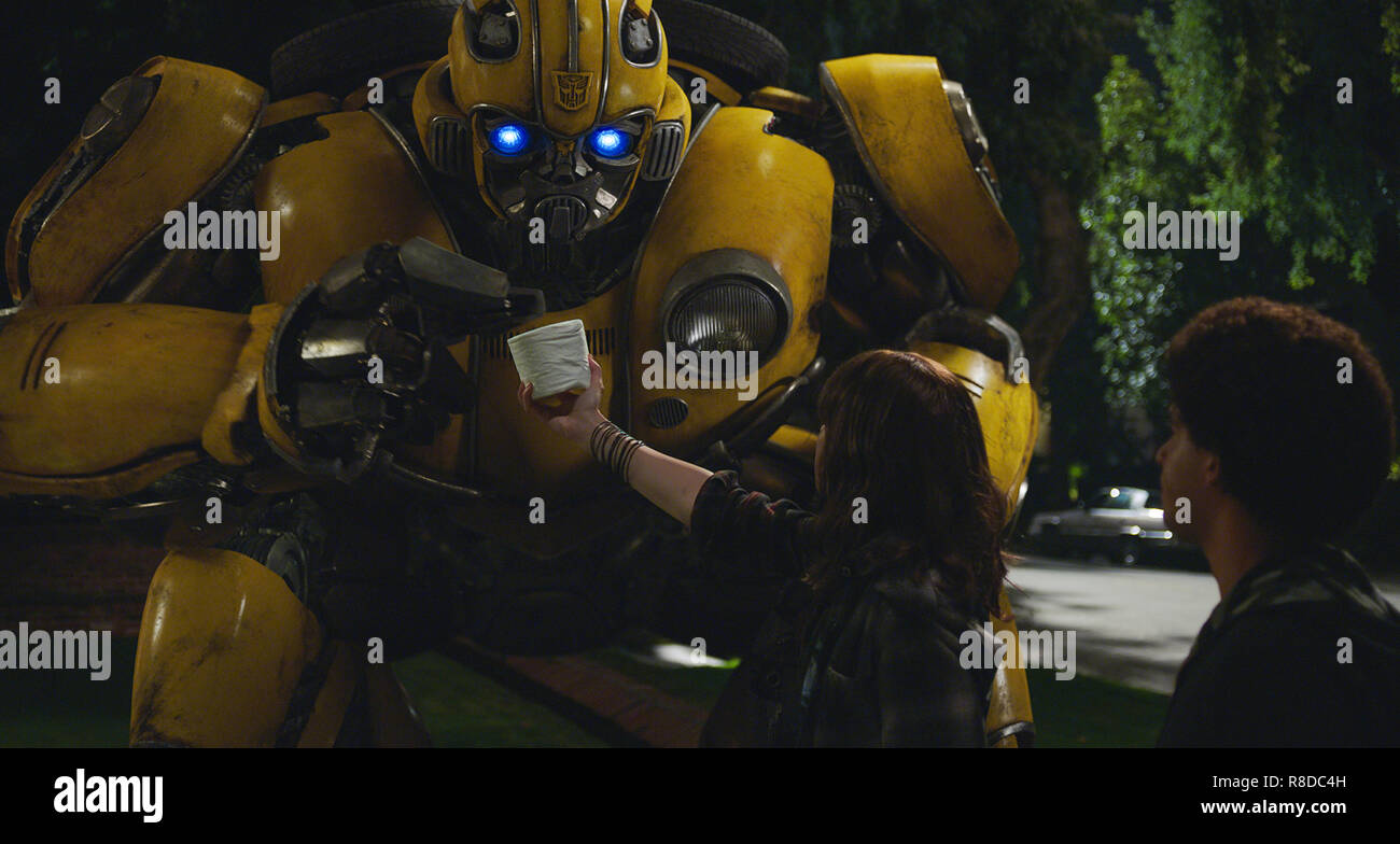 Left to right: Bumblebee, Hailee Steinfeld as Charlie and Jorge Lendeborg Jr. as Memo in BUMBLEBEE, from Paramount Pictures.  Photo Credit: Paramount Pictures / The Hollywood Archive Stock Photo