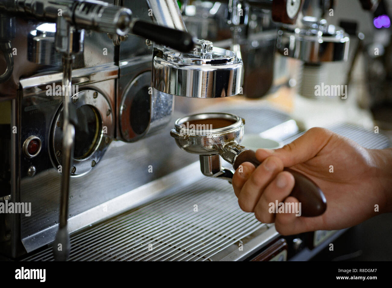 Easy to use. Portafilter with ground coffee. Espresso machine parts. Coffee machine or