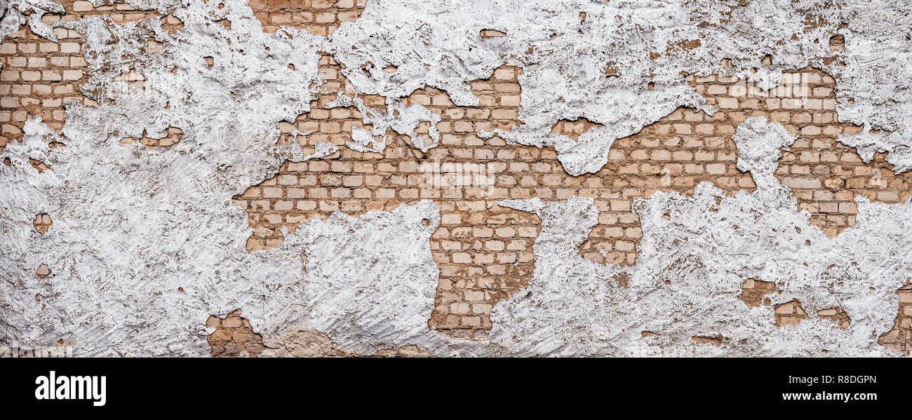 Old urban background, white ruined industrial brick wall with copy space Stock Photo