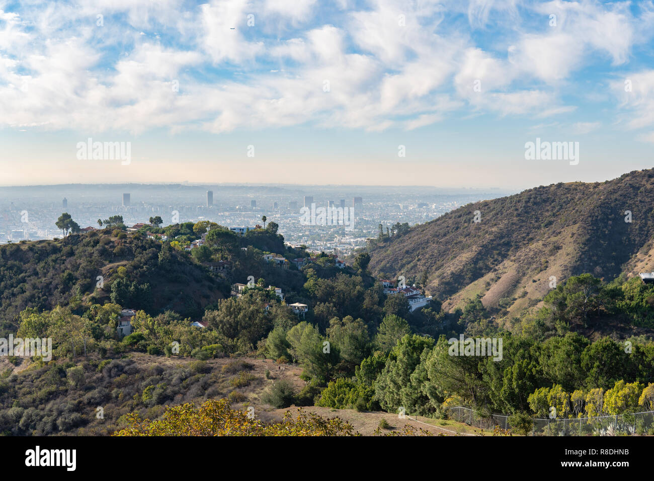 View of Los Angeles from the Hollywood Hills. Down Town LA. Hollywood Bowl. Warm sunny day. Beautiful clouds in blue sky. 101 freeway traffic Stock Photo