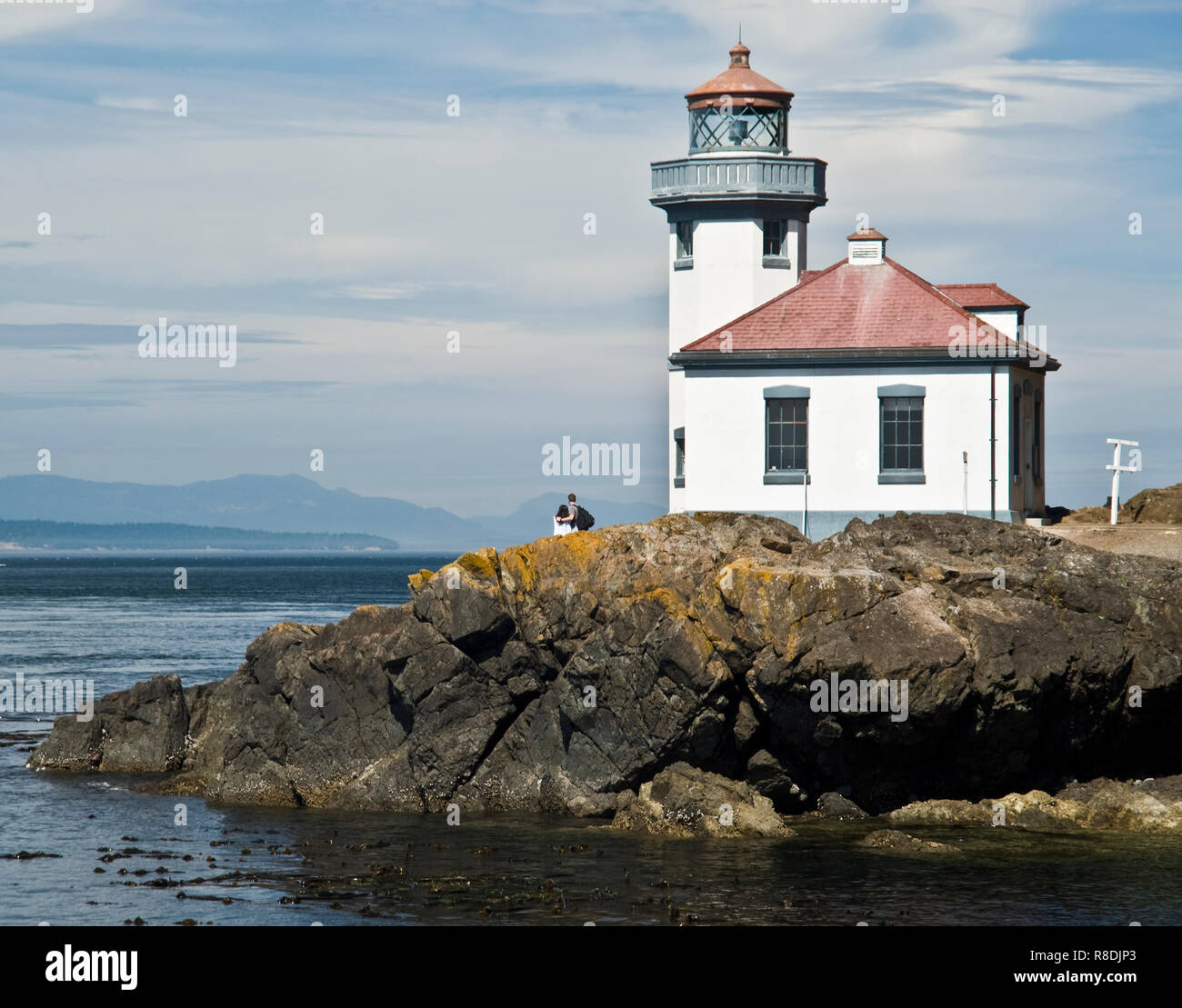 Built in 1919,the Lime Kiln lighthouse overlooks Dead Man's Bay on the western side of San Juan Island in Washington and is still functioning today. Stock Photo