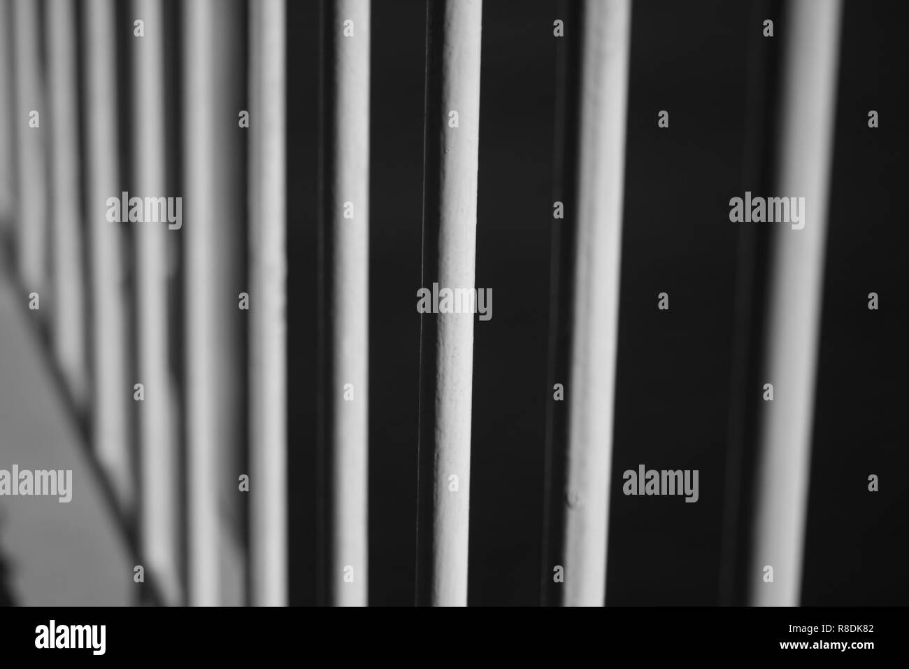 Abstract image of vertical bars in black and white monochrome photo Stock Photo