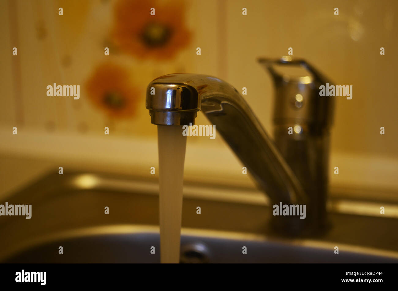 Water running down from the faucet Stock Photo Alamy