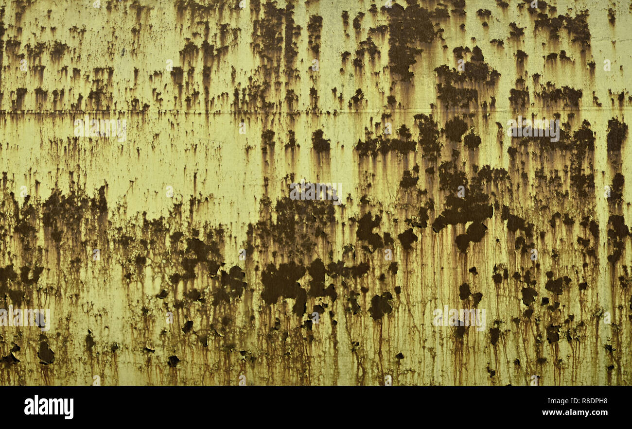 Rusty metal texture with scratched surface. Old painted metal wall with