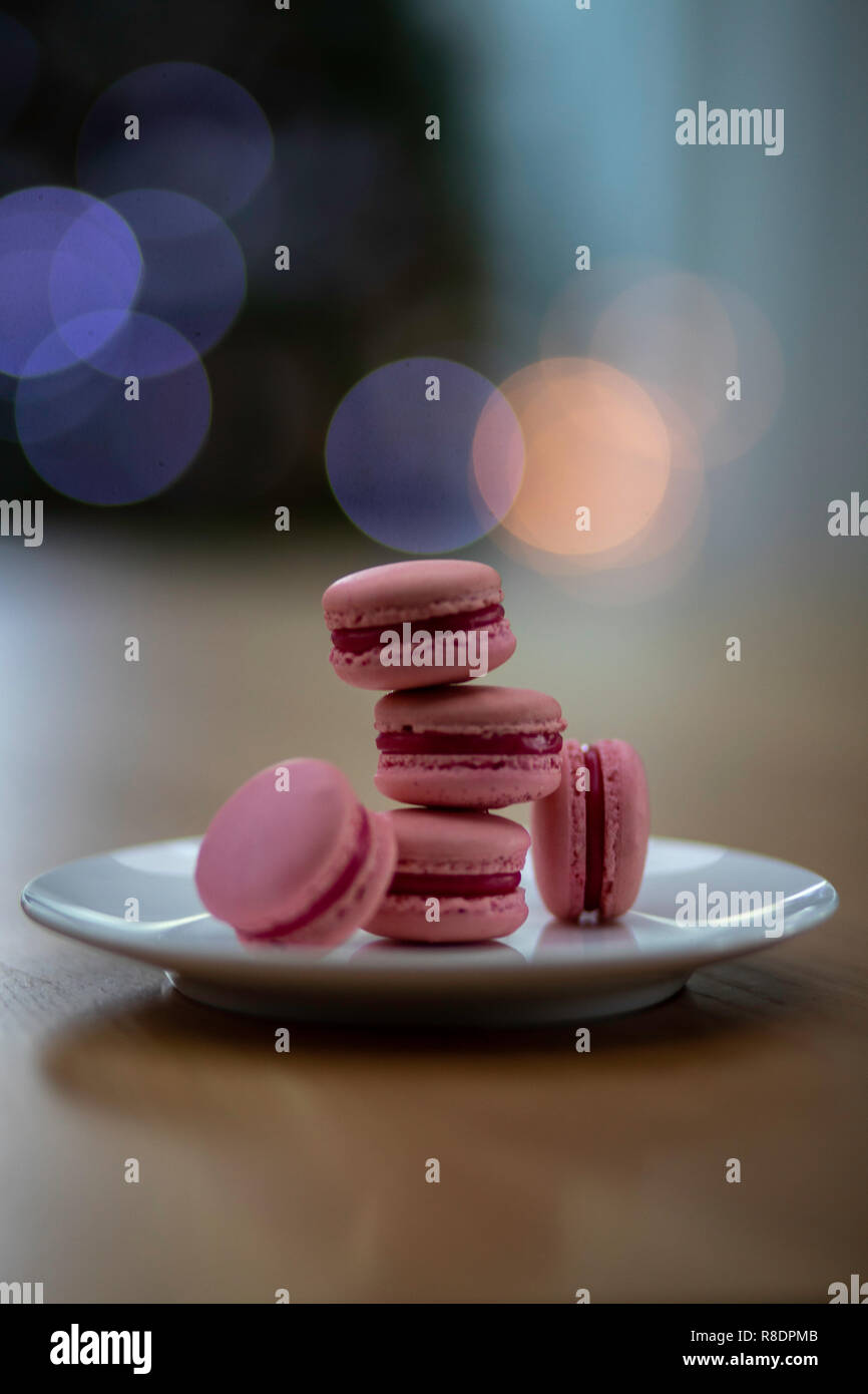 Macaron tower infront of a christmas tree Stock Photo