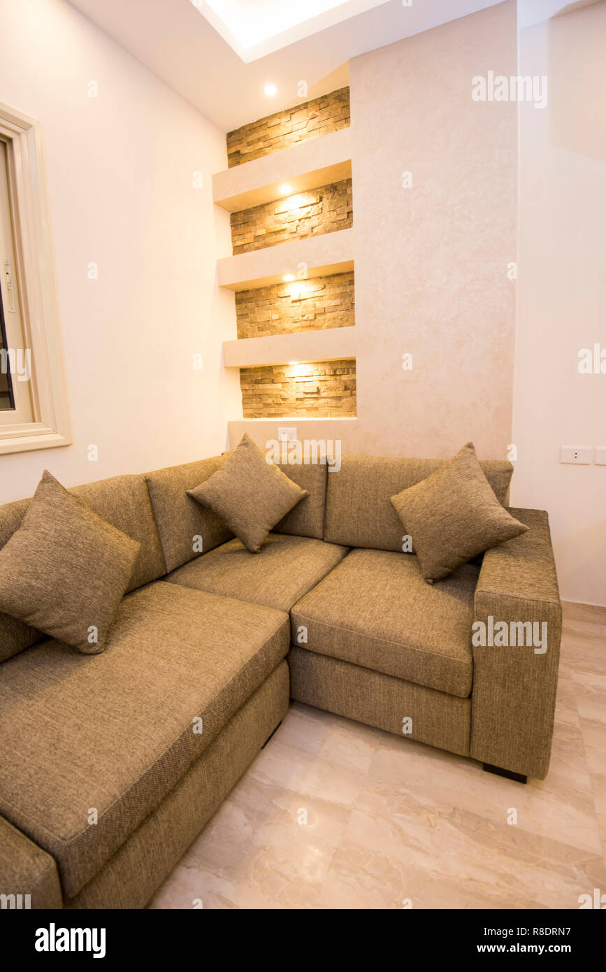Living room lounge sofa in luxury apartment show home showing interior