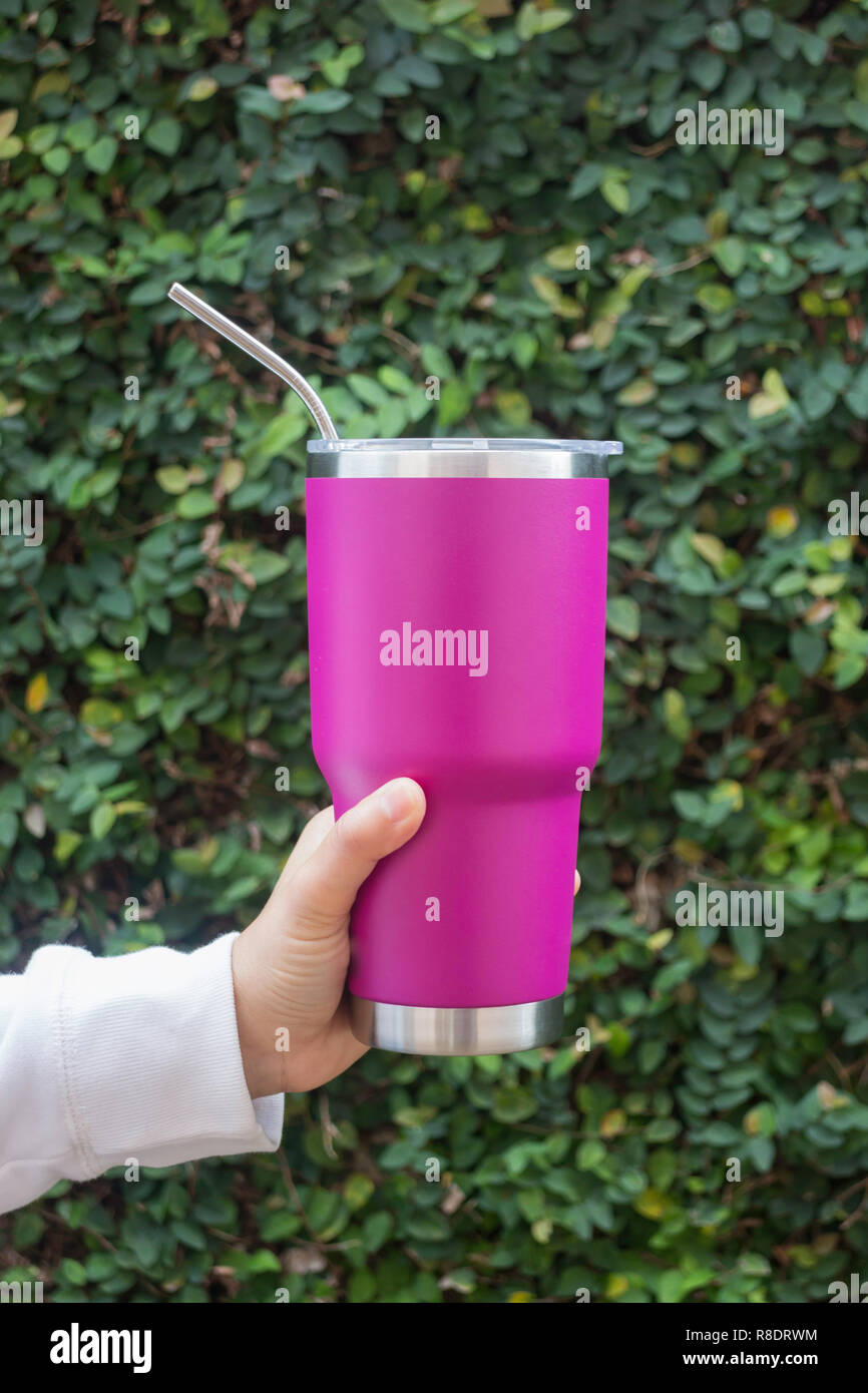 Hand on large water bottle for keeping temperature, stock photo Stock