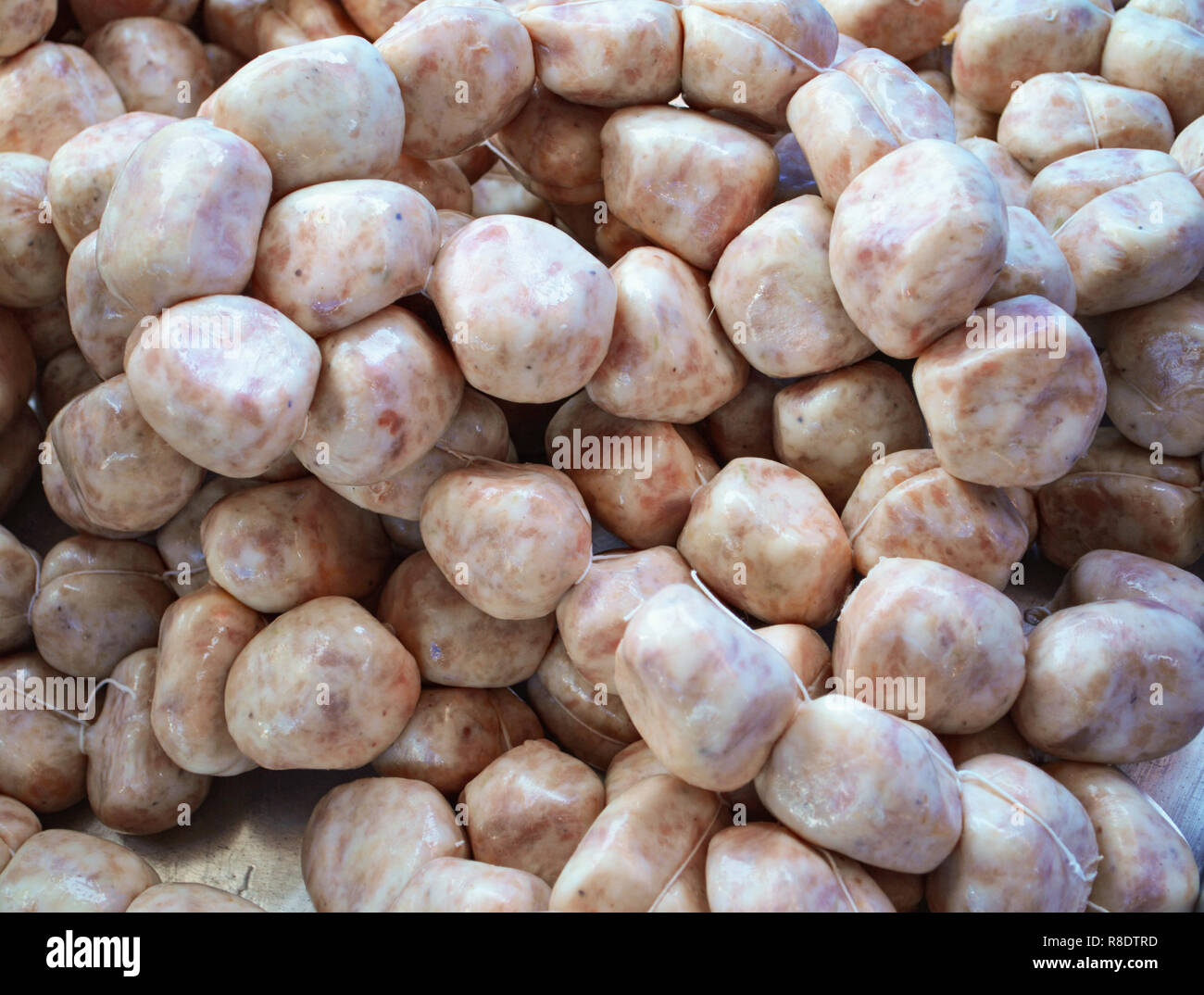 raw pork sausage round / pork and rice sausage circular thai style