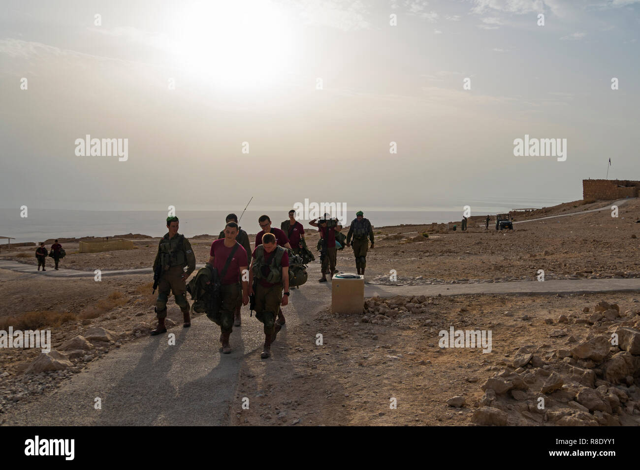 Soldiers are patrolling for security Israeli army military exercises in the early morning in the ruins of the fortress Massada. Masada. Israel. 23 Oct Stock Photo