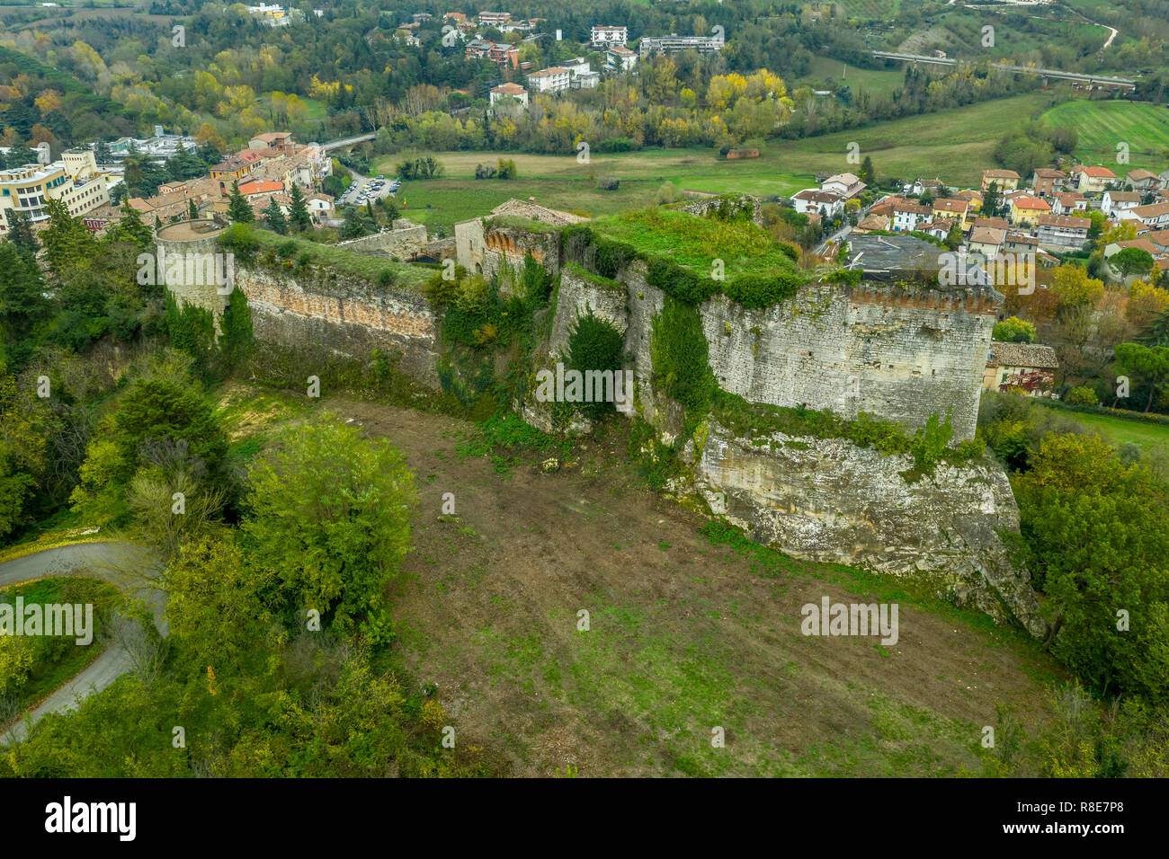 Aerial view of thermal spa town, Gothic medival castle fortezza and colorful houses in Castrocaro Terme, Cesena Forli province, Emilia Romagna, Italy Stock Photo