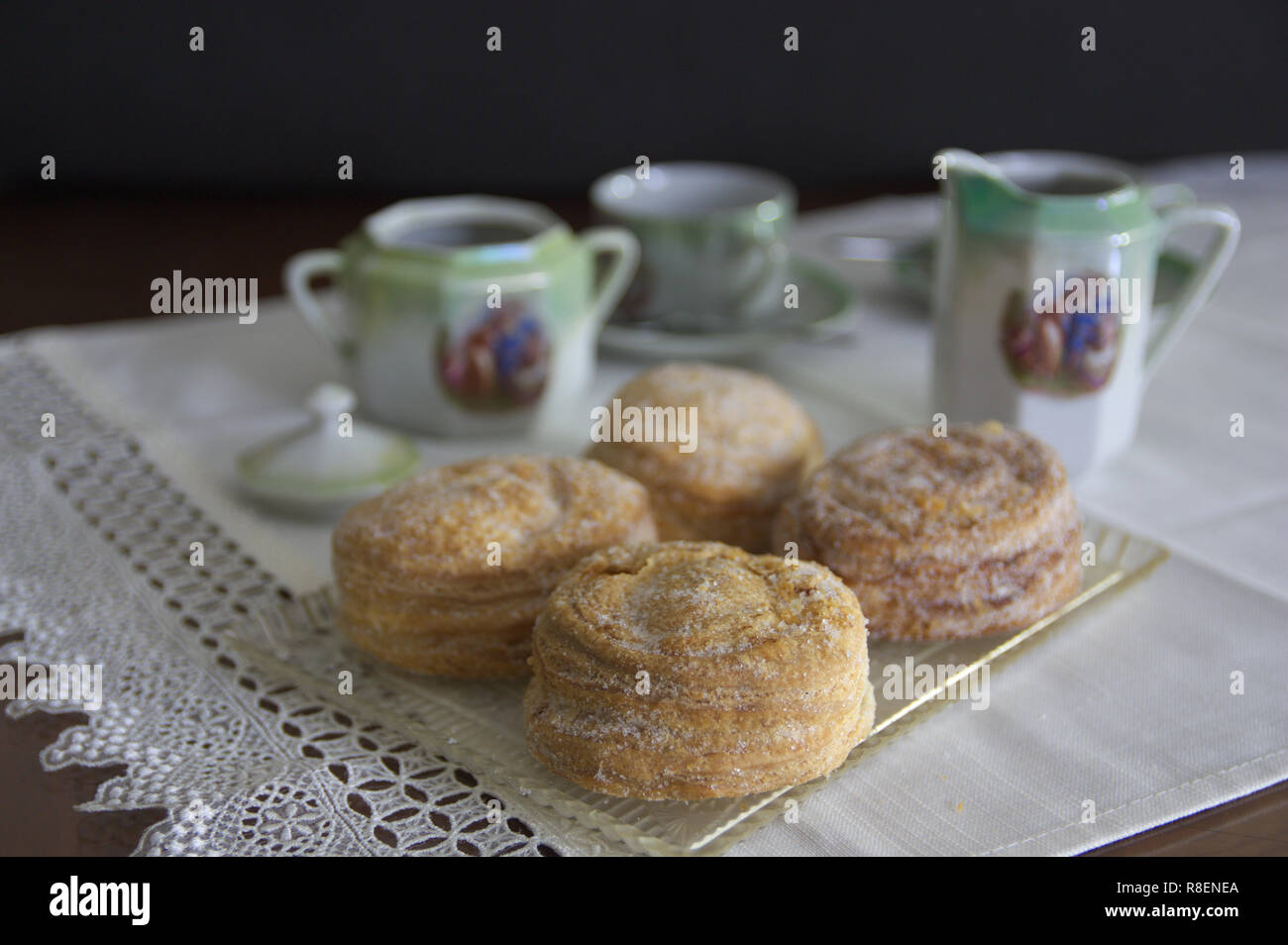 Close-up of a table ready for a coffee and puff pastry filled with angel hair with a vintage decoration Stock Photo