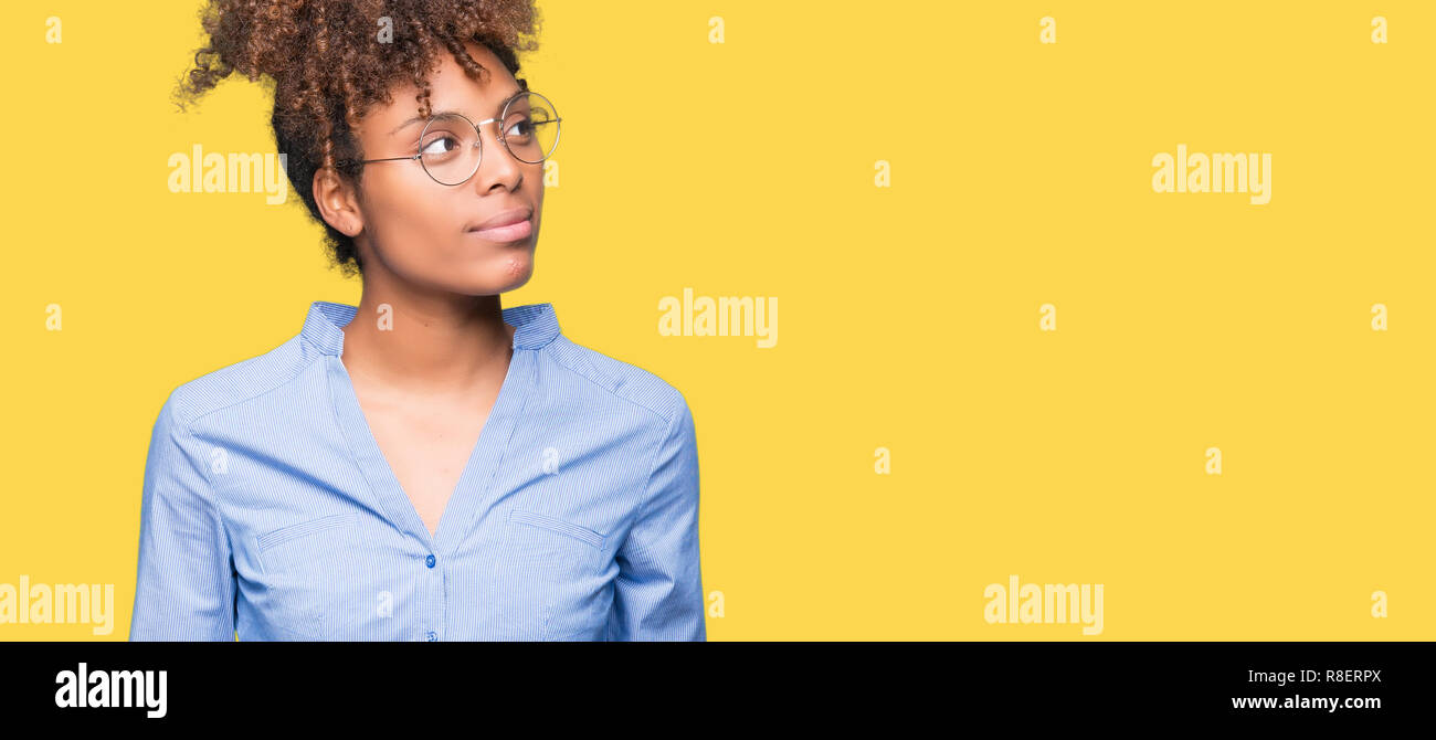 Beautiful young african american business woman over isolated ...