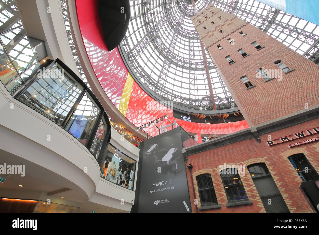 People visit Melbourne Central shopping mall and train station in
