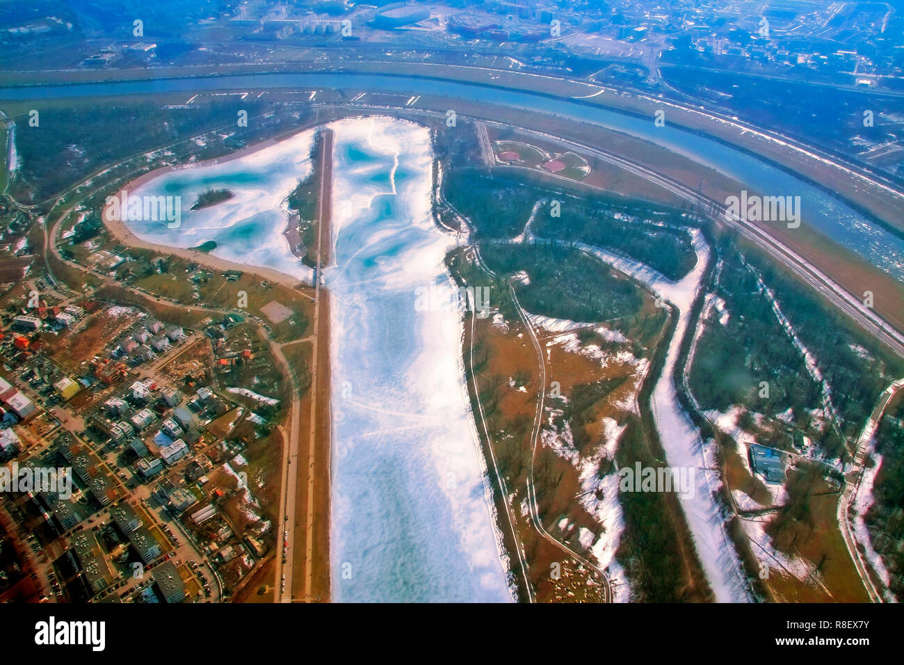 Zagreb, Croatia - February 25, 2012: Flying over the frozen lake Jarun in Zagreb with the cessna airplane Stock Photo