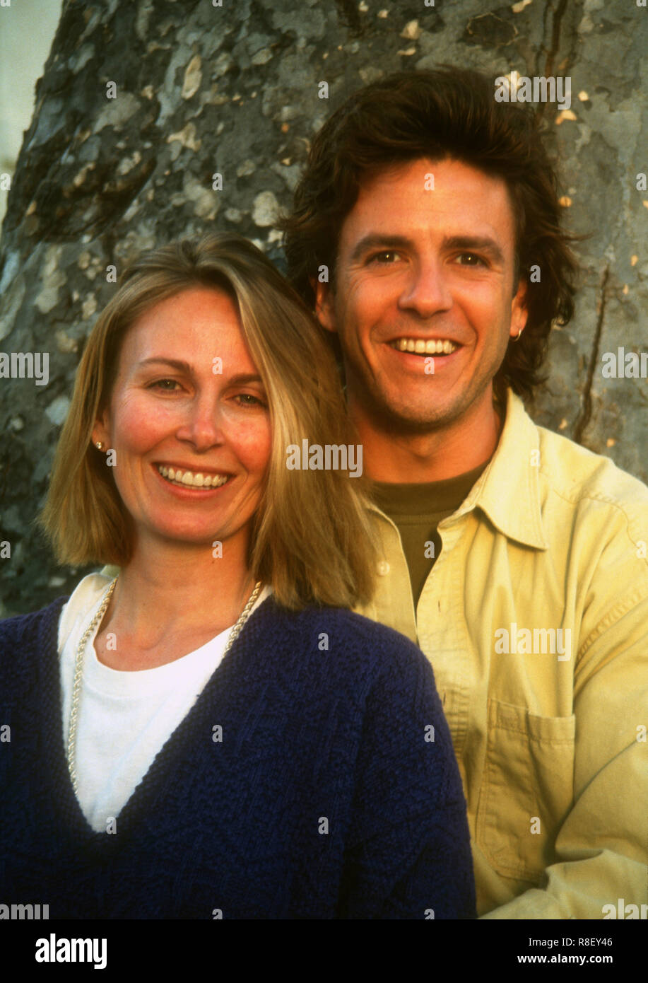 LOS ANGELES, CA - APRIL 23: (EXCLUSIVE) Actor Scott Valentine and wife Kym Fisher pose at a photo shoot on April 23, 1993 in Los Angeles, California. Photo by Barry King/Alamy Stock Photo Stock Photo