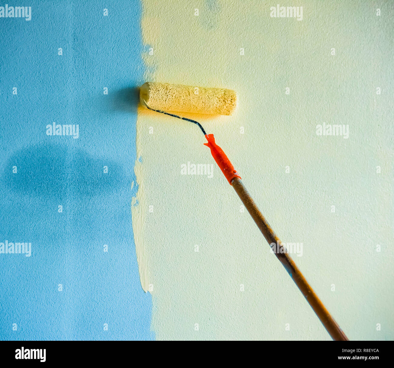 Painted Wall Background Hand Painting Wall With Paint Roller On