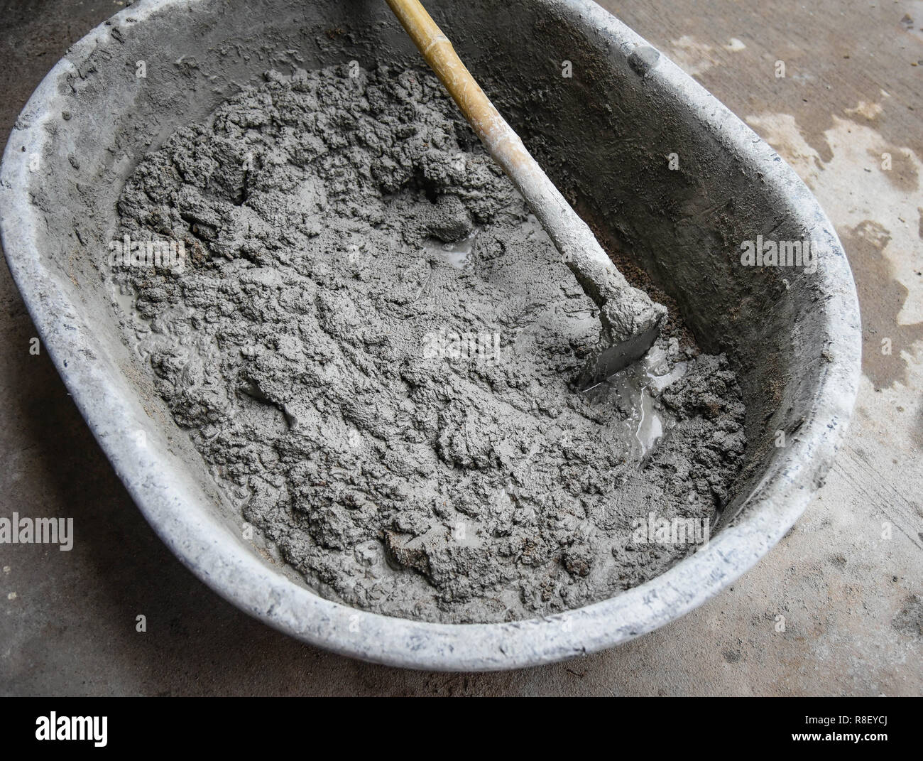 cement mixer construction site / cement mortar mixer with hoe on basin