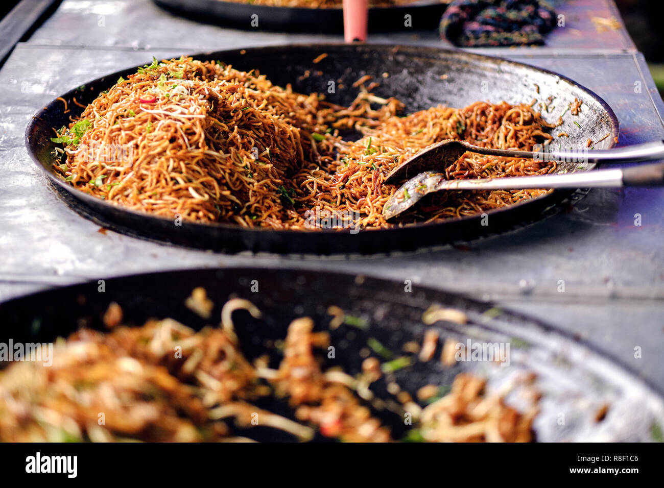 Asian, Indian and Chinese street food. Food court on local market of
