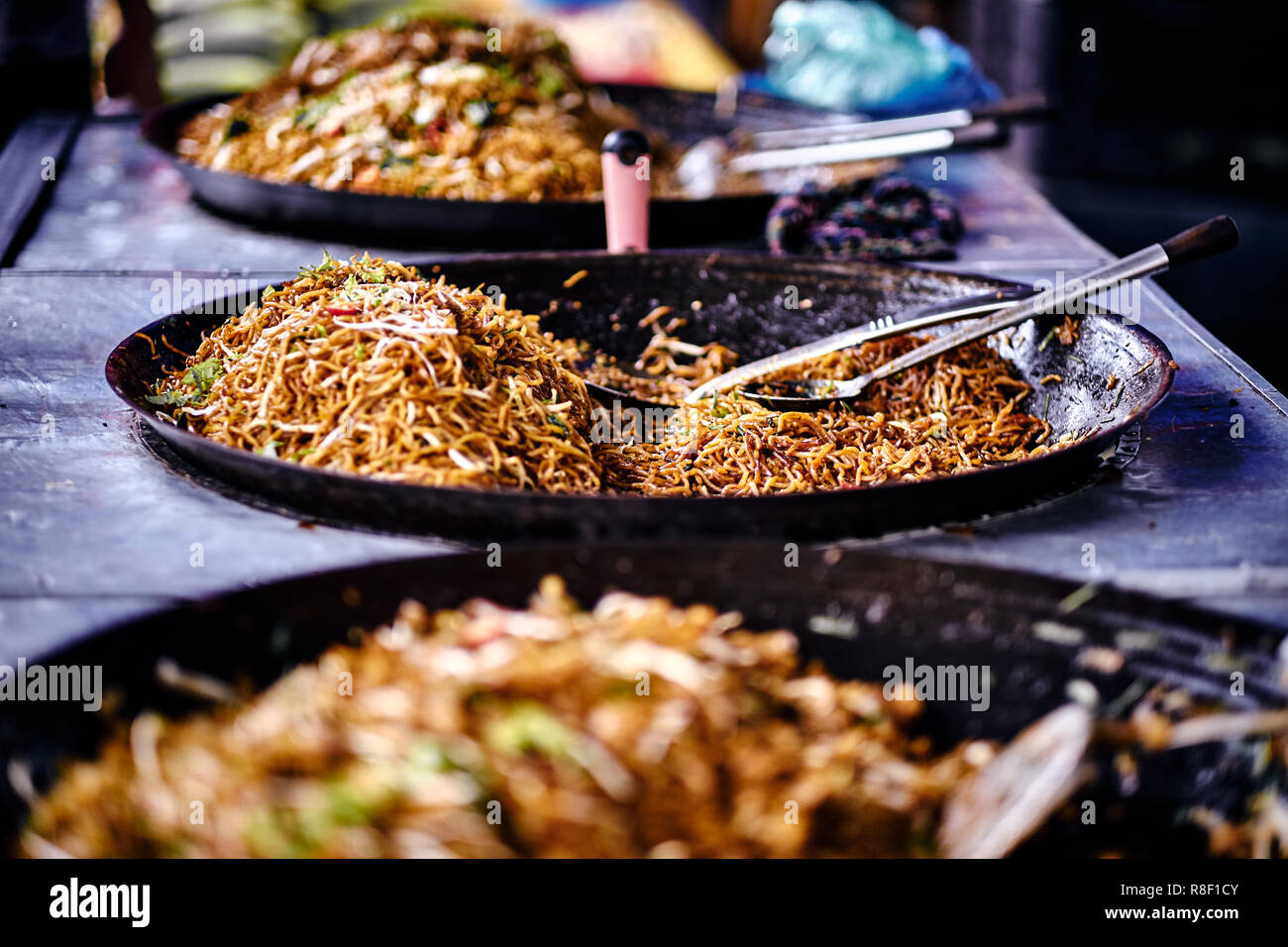 Asian, Indian and Chinese street food. Food court on local market of
