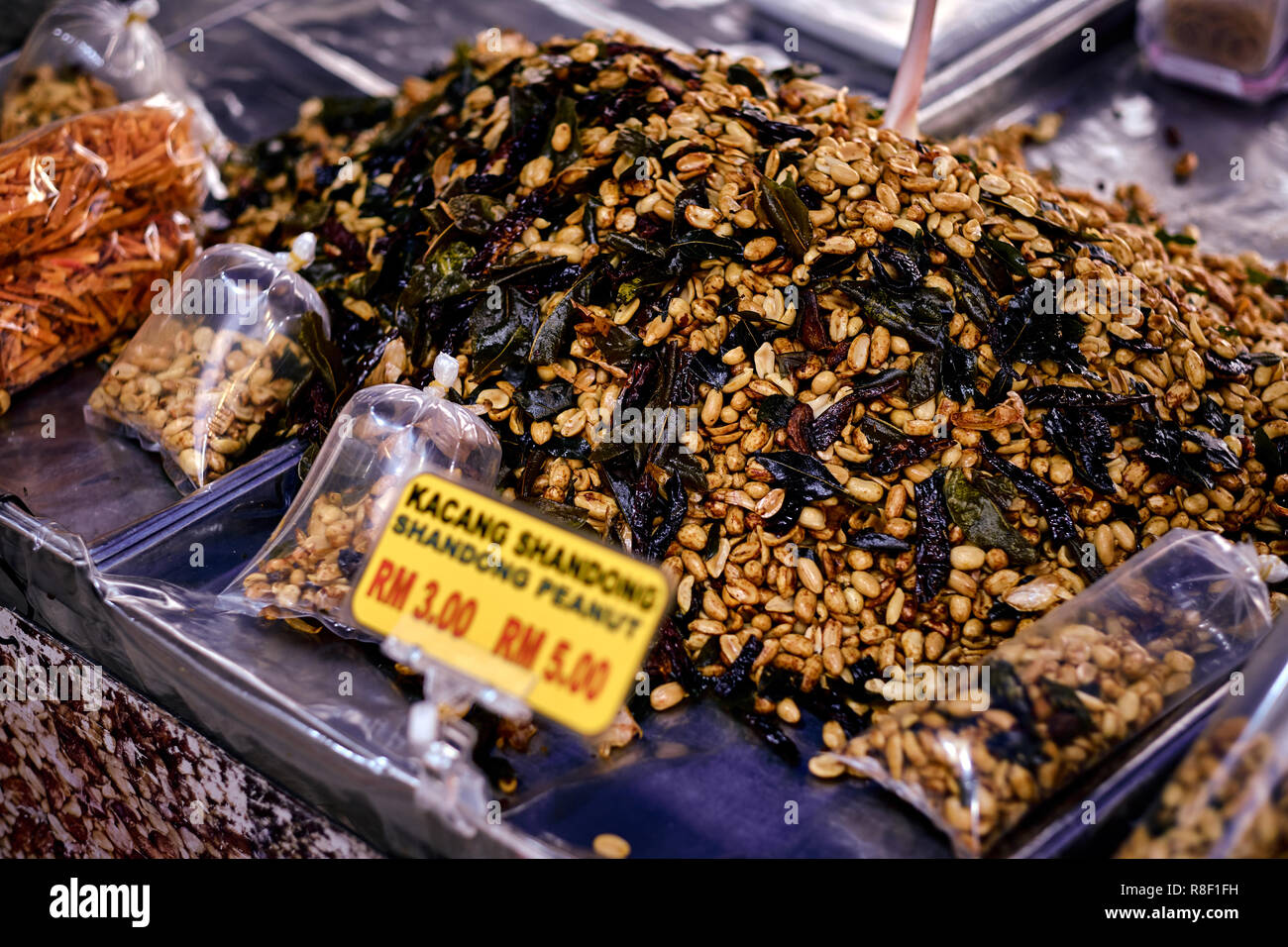 Fried peanut with chilly pepper traditional asian street food. Asian