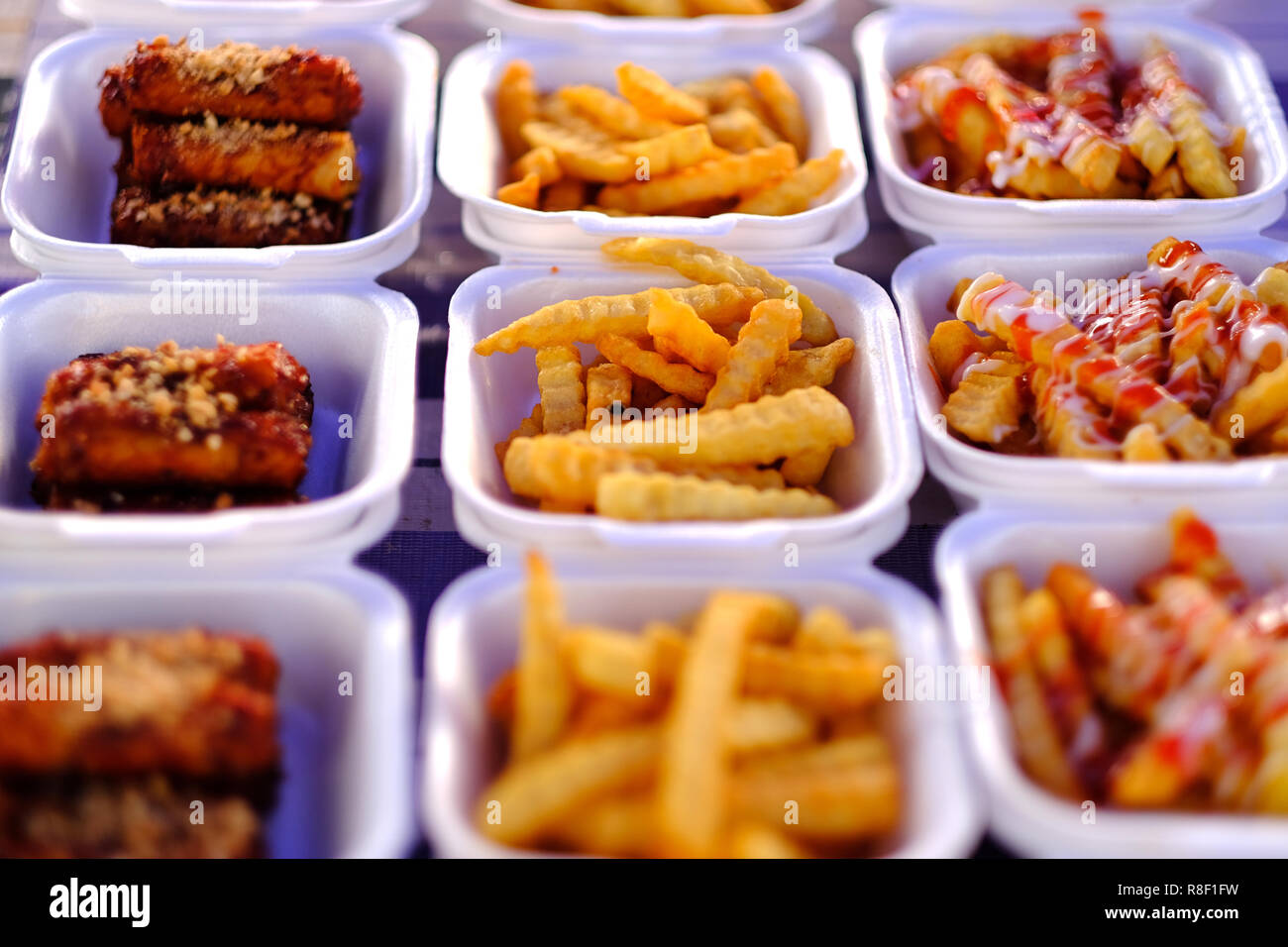Asian, Indian and Chinese street food. Food court on local market of