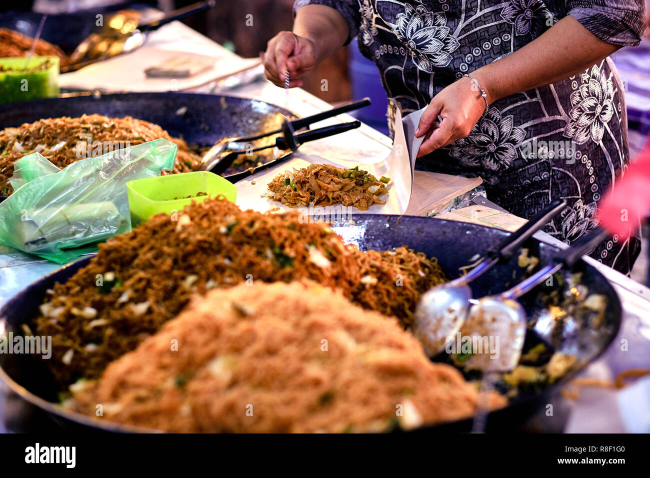 Asian, Indian and Chinese street food. Food court on local market of