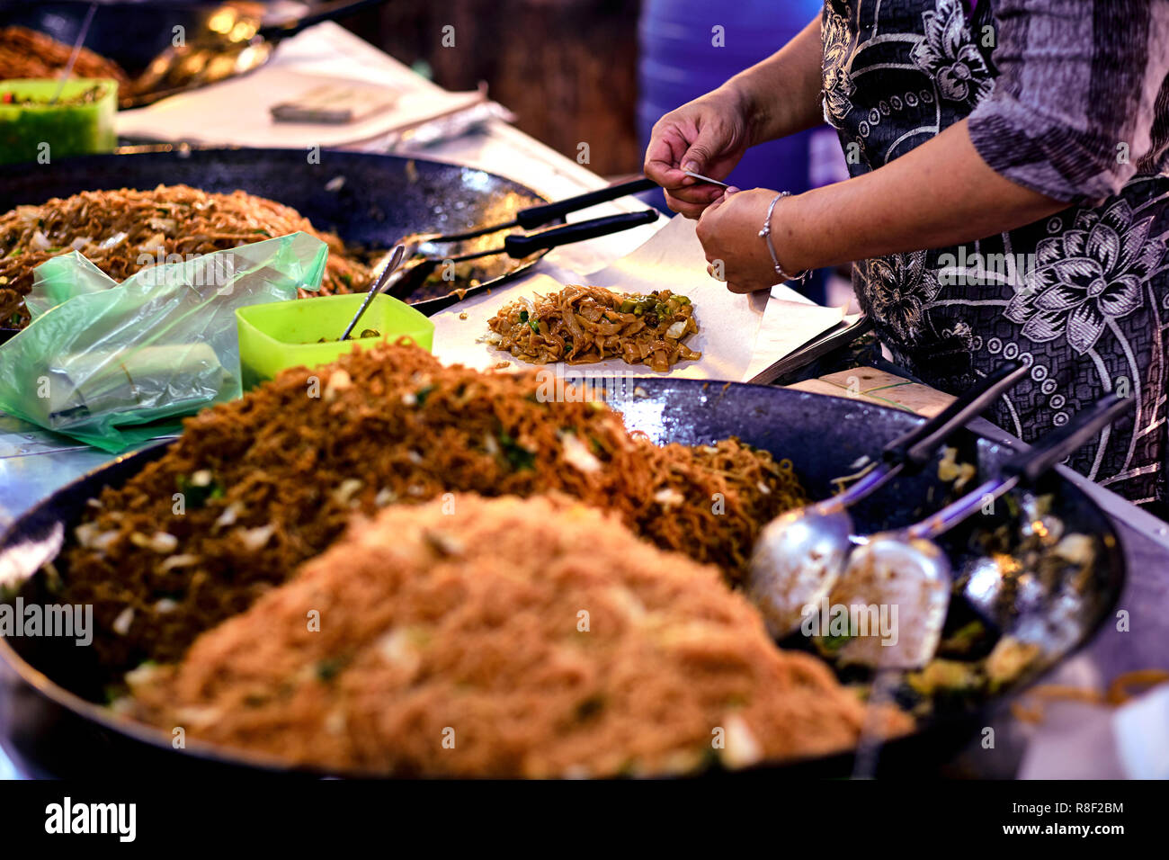 Asian, Indian and Chinese street food. Food court on local market of