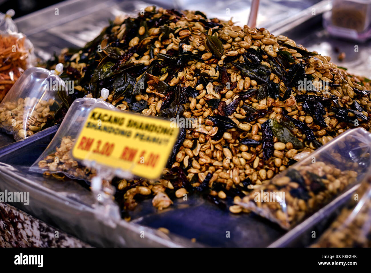 Fried peanut with chilly pepper traditional asian street food. Asian