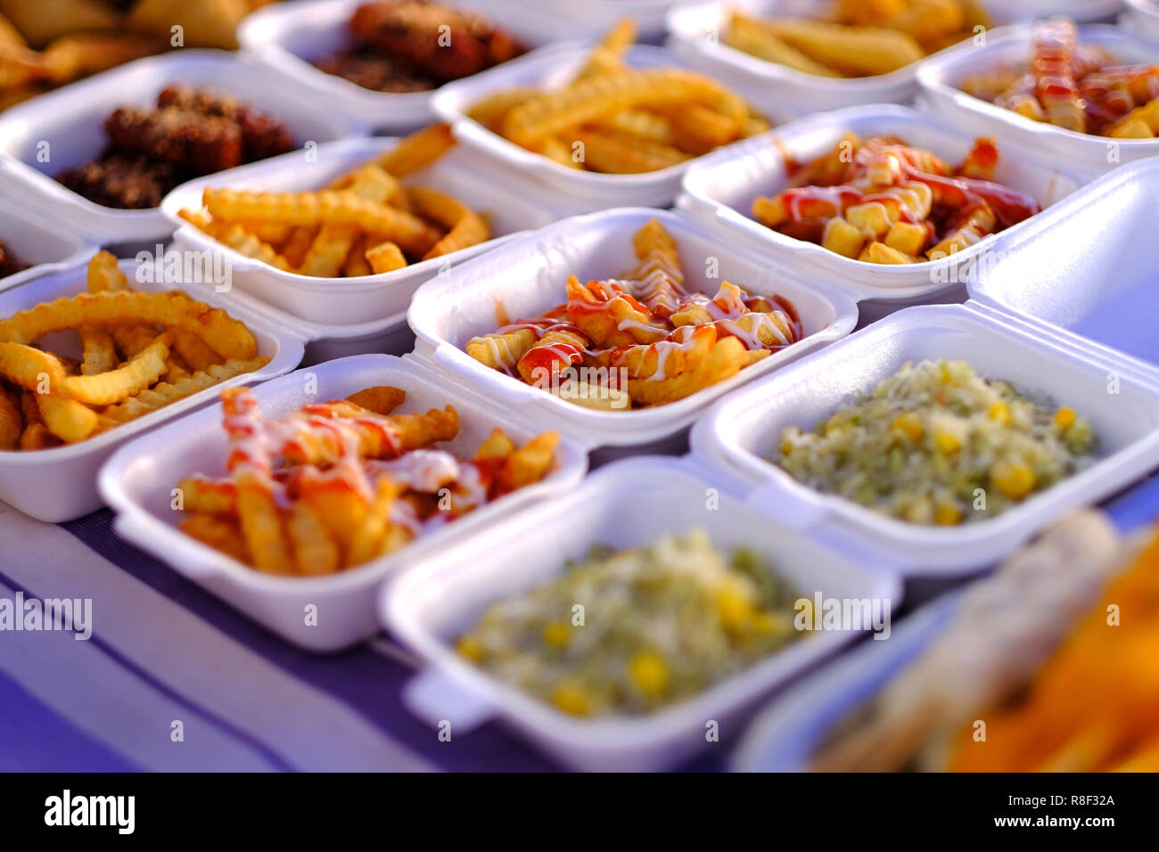 Asian, Indian and Chinese street food. Food court on local market of