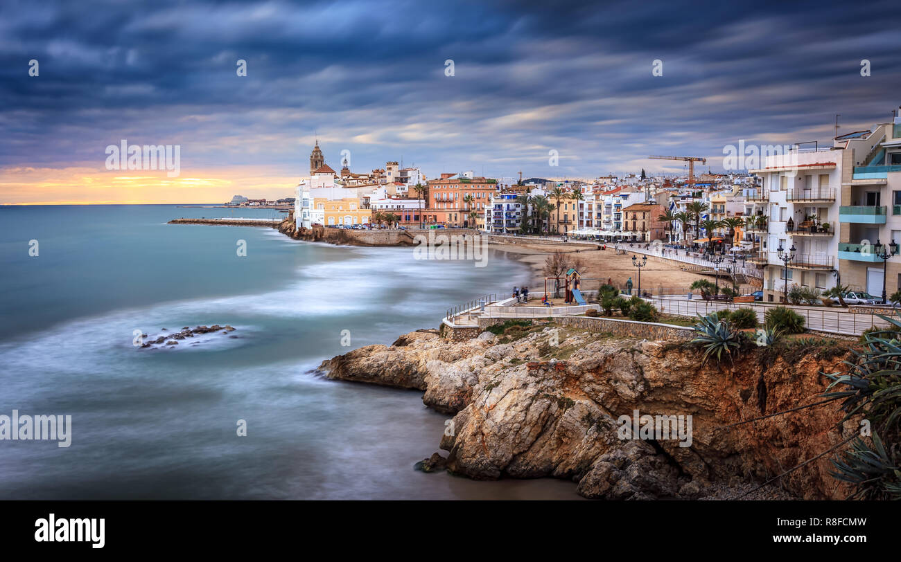 Sunset over Sitges, Catalunya, Spain. Sitges is a famous town near Barcelona, famous for it's nightlife and beaches. It is a gay friendly city. Stock Photo
