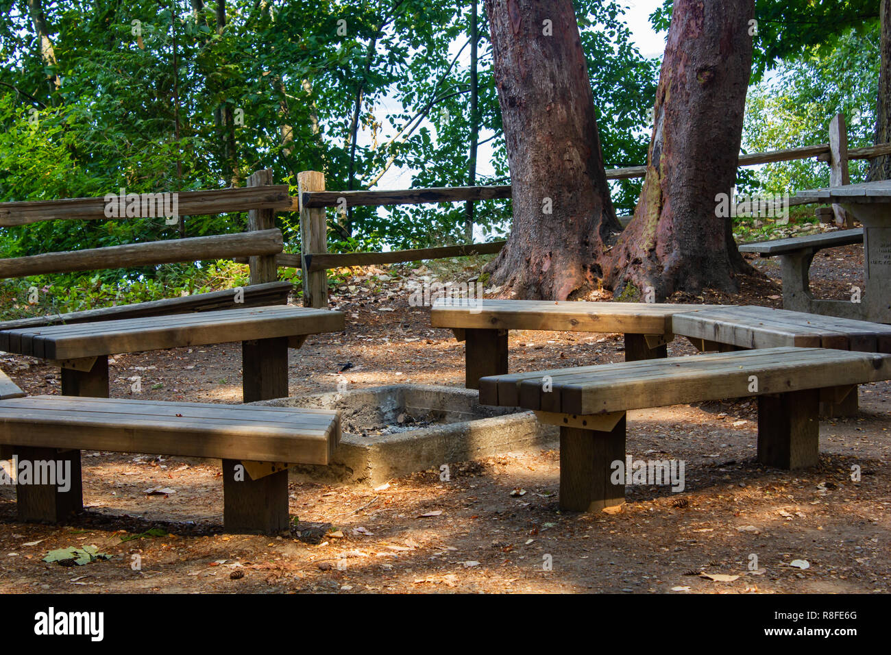 Wood bench around outlet fire pit