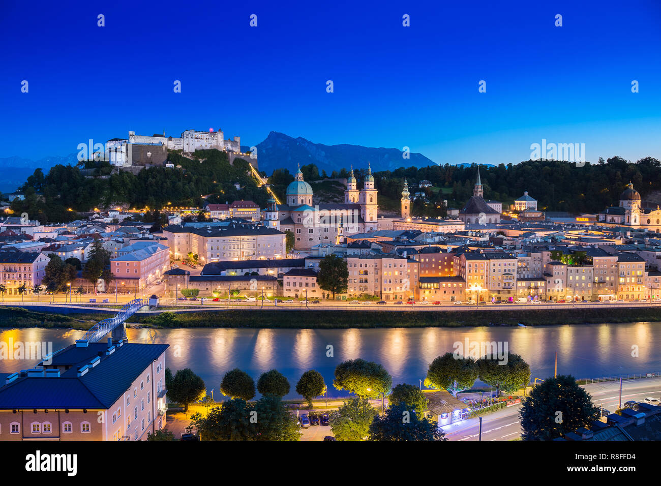 View of cityscape of Salzburg Cathedral, Fortress Hohensalzburg, and old castle in center of old town, where is the famous landmark for travel from to Stock Photo