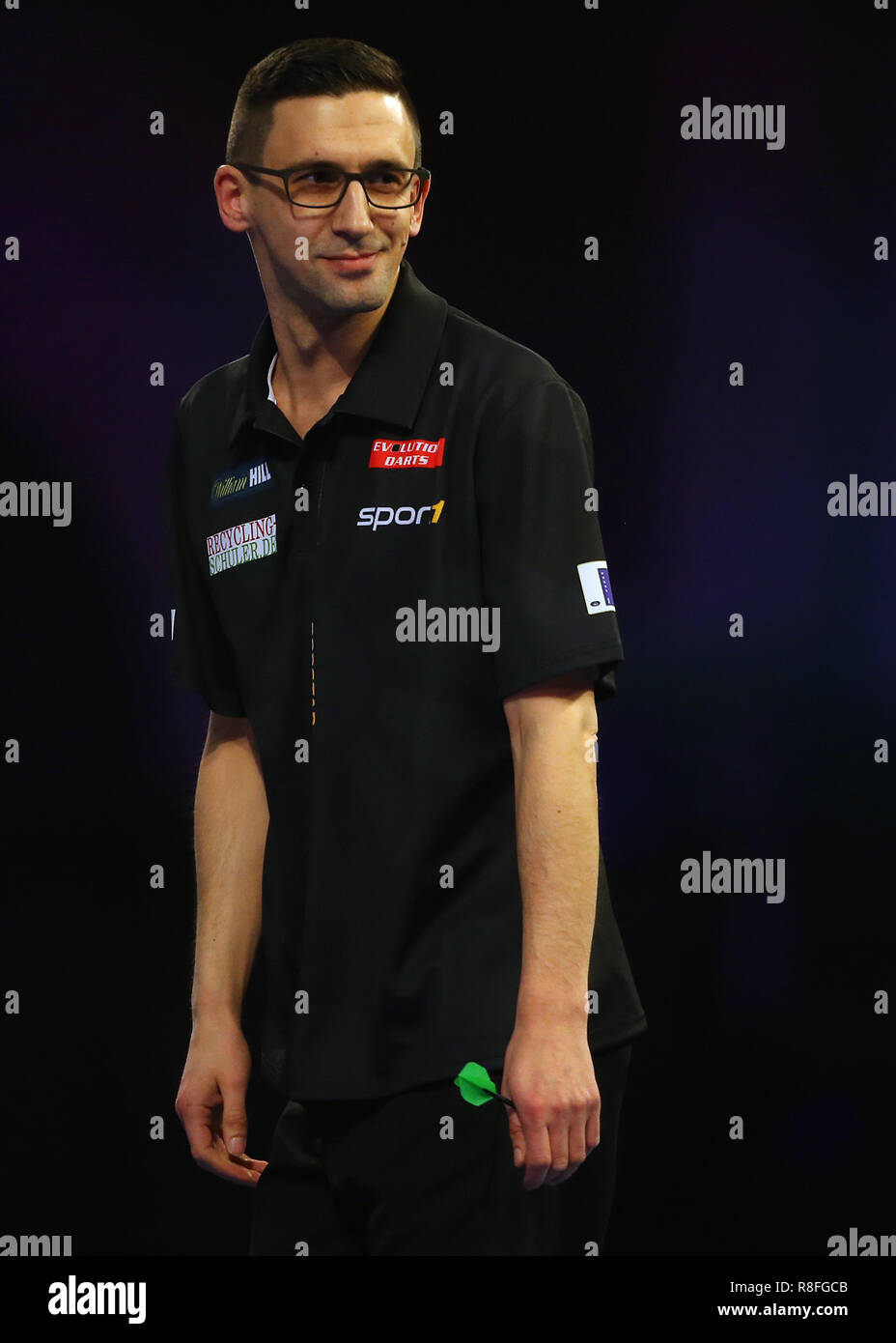 Robert Marijanovic reacts during his match against Richard North during day three of the William Hill World Darts Championships at Alexandra Palace, London Stock Photo