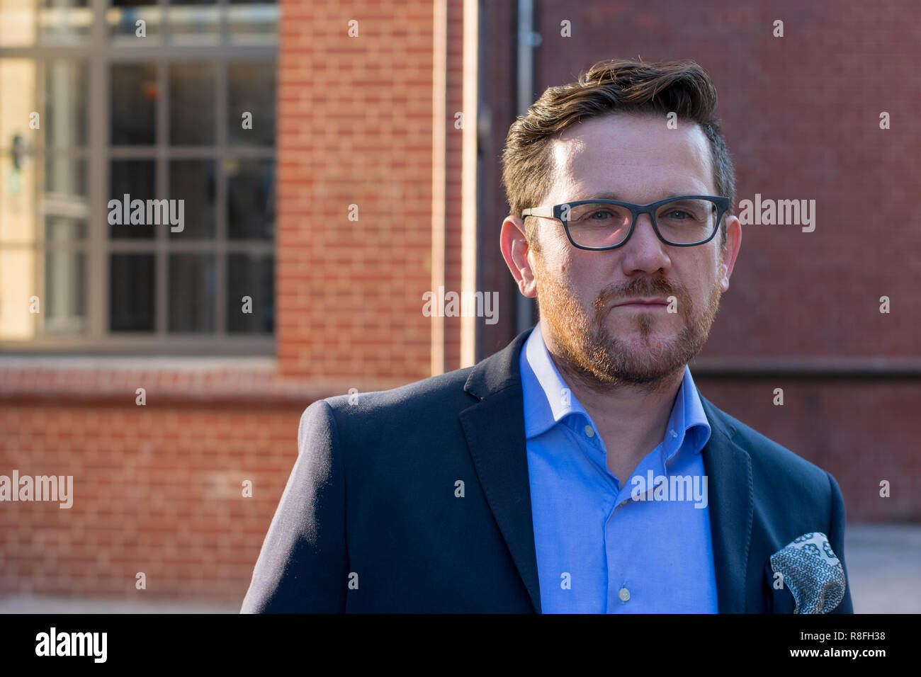 Business man with glasses outside Stock Photo