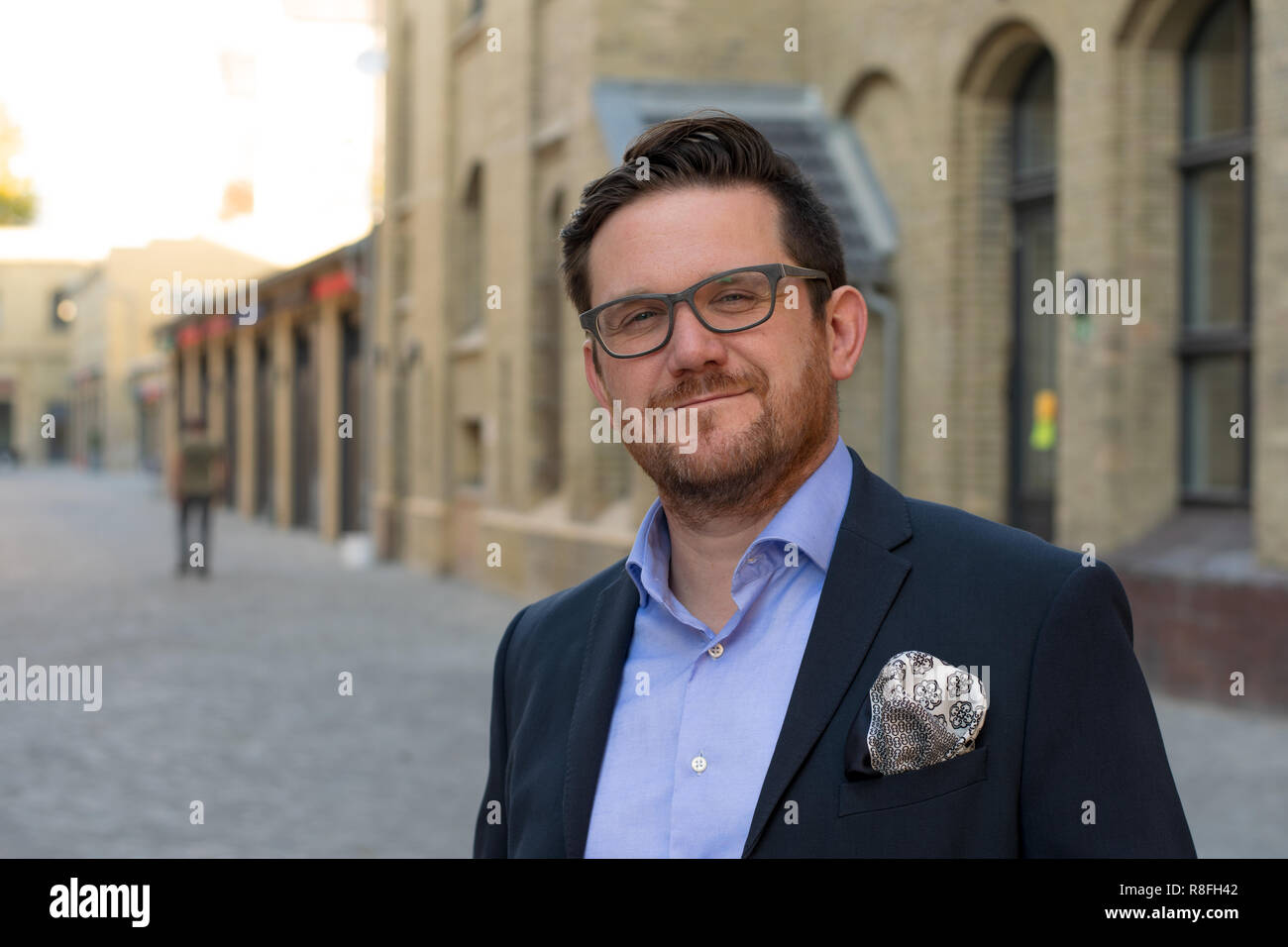 Business man with glasses outside Stock Photo