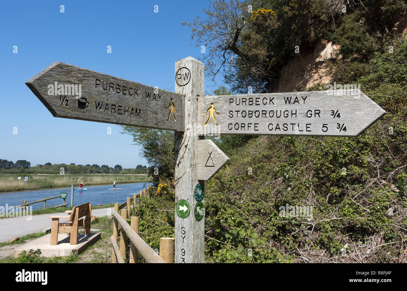 Wooden signpost on the Purbeck Way next to the River Frome in Dorset, England, UK Stock Photo