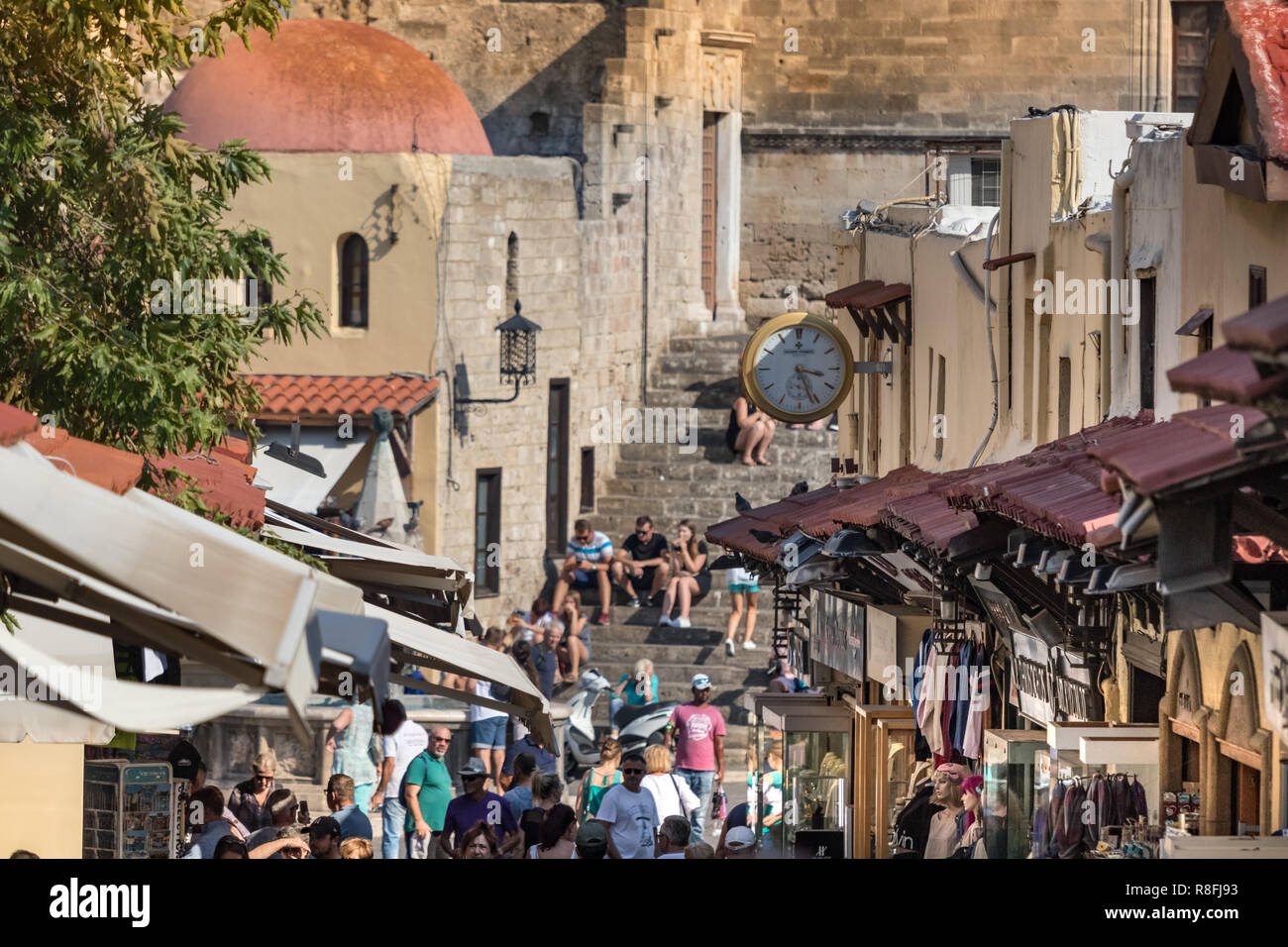 Rhodes, Greece - October 10th, 2018: View of a main commercial steet and souvenirs market inside the old town of Rhodes, Greece. Stock Photo