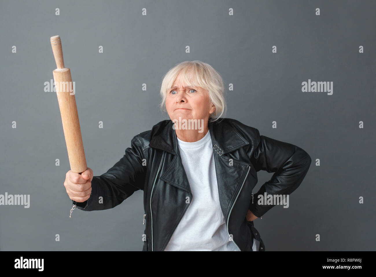 Angry old woman rolling pin hi-res stock photography and images - Alamy