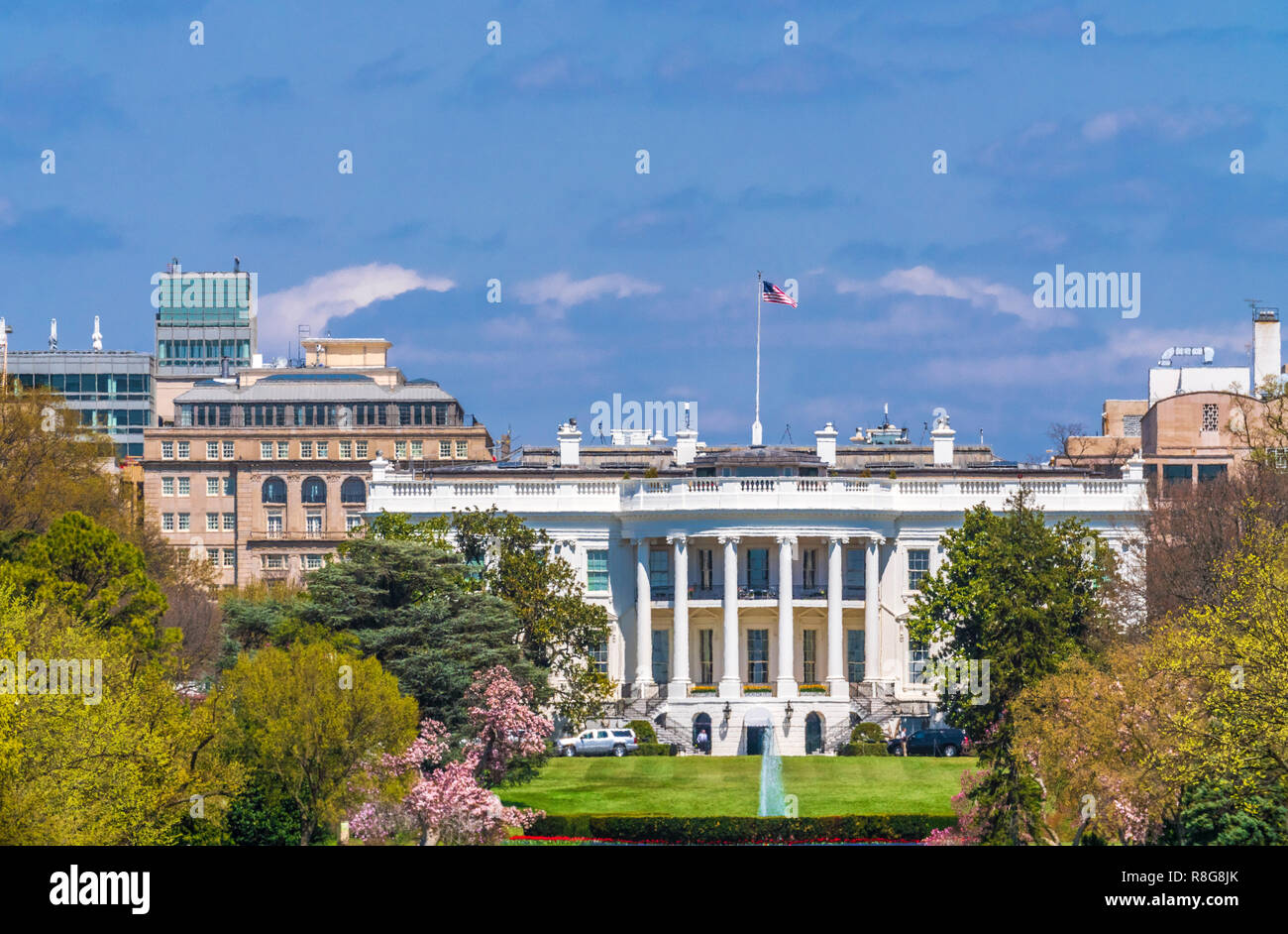 The White House with blue sky background Stock Photo - Alamy