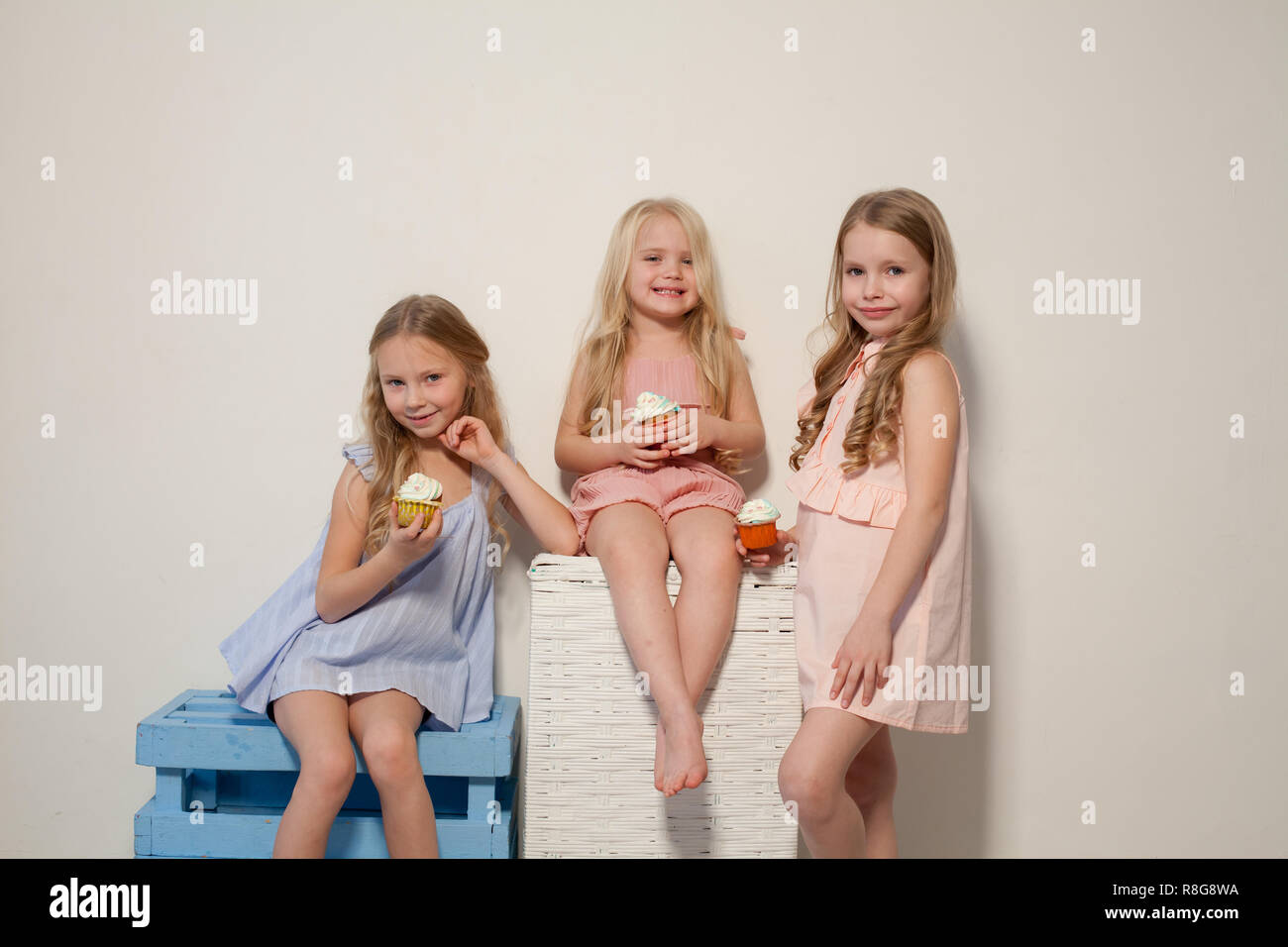 three girls girlfriend eat candy lollipop sister Stock Photo