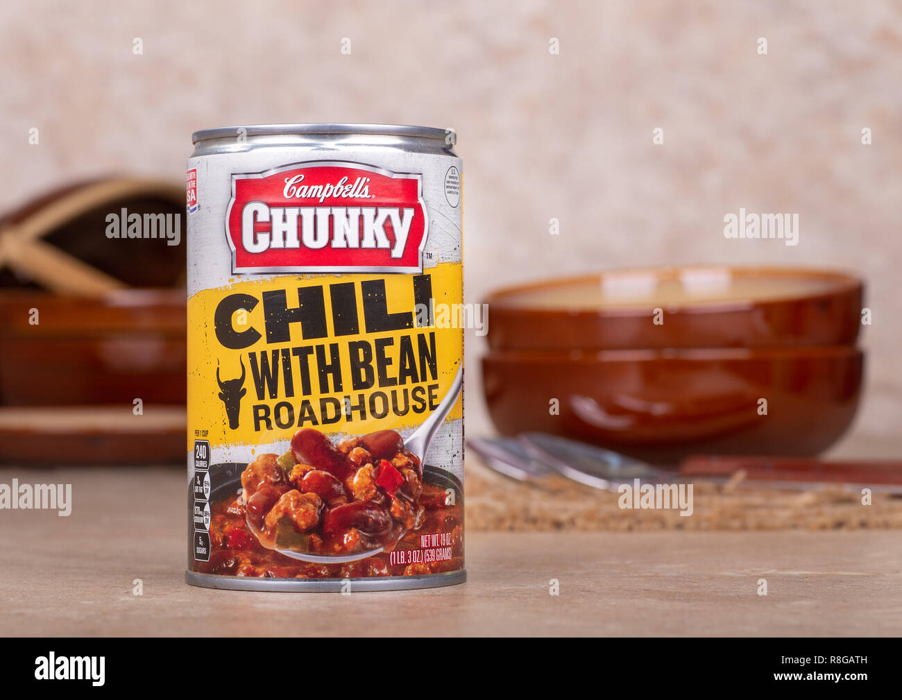 DECEMBER 13, 2018: Closeup of a can of Campbells Chunky Chili With Bean Roadhouse soup on a kitchen counter Stock Photo