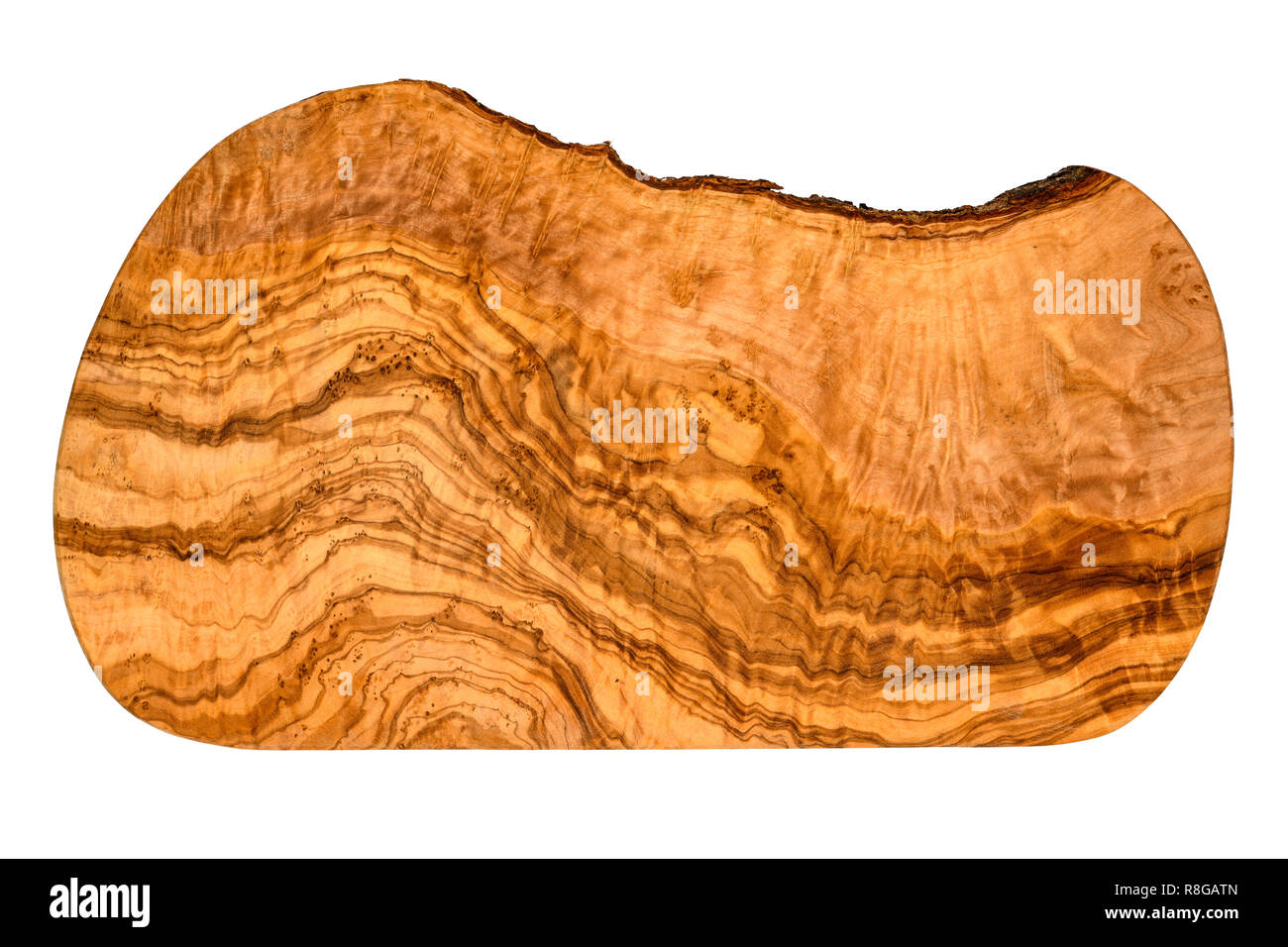 Top view of an olive wood serving and cutting board with vivid wood grain pattern isolated on white. Stock Photo